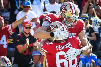 CARSON, CA - SEPTEMBER 30: Tight end George Kittle #85 of the San Francisco 49ers celebrates his touchdown against the Los Angeles Chargers with offensive tackle Mike Person #68 at StubHub Center on September 30, 2018 in Carson, California. (Photo by Jayn
