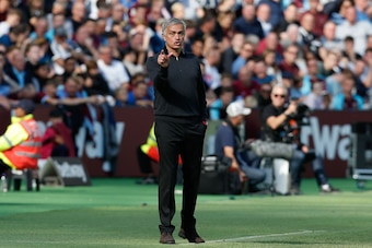 Manchester United's Portuguese manager Jose Mourinho gestures from the touchline during the English Premier League football match between West Ham United and Manchester United at The London Stadium, in east London on September 29, 2018. (Photo by Ian KING