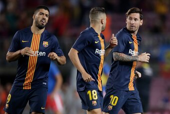 BARCELONA, SPAIN - SEPTEMBER 23: (L-R) Luis Suarez of FC Barcelona, Jordi Alba of FC Barcelona, Lionel Messi of FC Barcelona  during the La Liga Santander  match between FC Barcelona v Girona at the Camp Nou on September 23, 2018 in Barcelona Spain (Photo