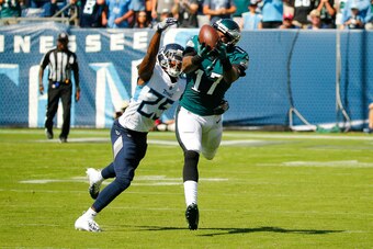 NASHVILLE, TN - SEPTEMBER 30: Alshon Jeffery #17 of the Philadelphia Eagles catches a pass from Carson Wentz while defended by Adoree' Jackson #25 of the Tennessee Titans during the second quarter at Nissan Stadium on September 30, 2018 in Nashville, Tenn