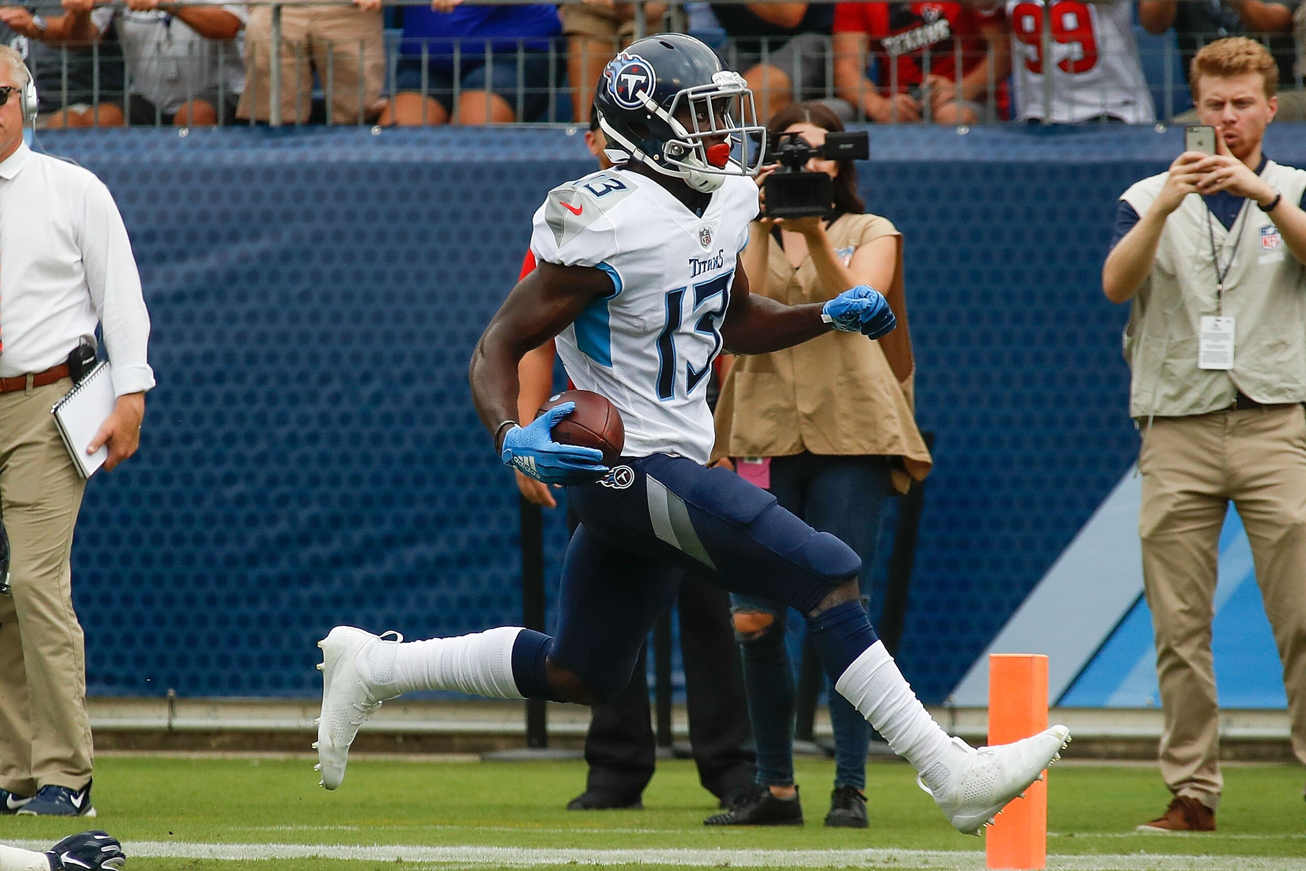NASHVILLE, TN - SEPTEMBER 16:  Taywan Taylor #13 of the Tennessee Titans scores a touchdown against the Houston Texans at Nissan Stadium on September 16, 2018 in Nashville, Tennessee.  (Photo by Frederick Breedon/Getty Images)