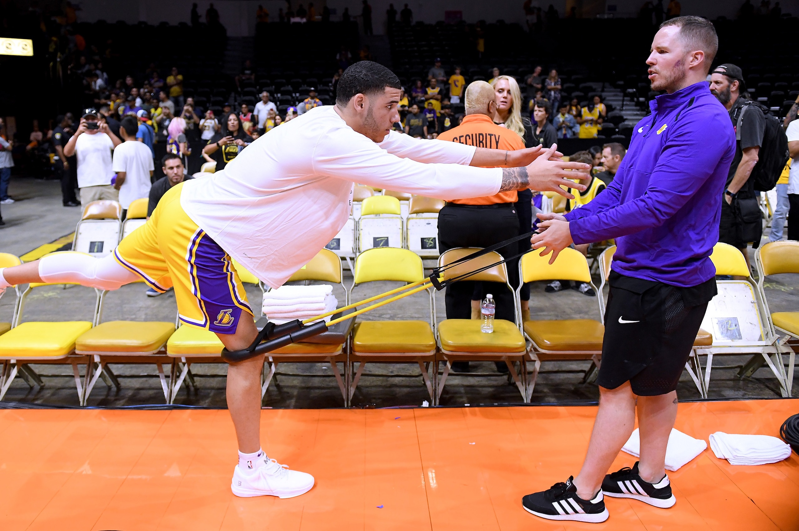 SAN DIEGO, CA - SEPTEMBER 30: Lonzo Ball #2 of the Los Angeles Lakers works out with a trainer before a preseason game against the Denver Nuggets at Valley View Casino Center on September 30, 2018 in San Diego, California.  (Photo by Harry How/Getty Image