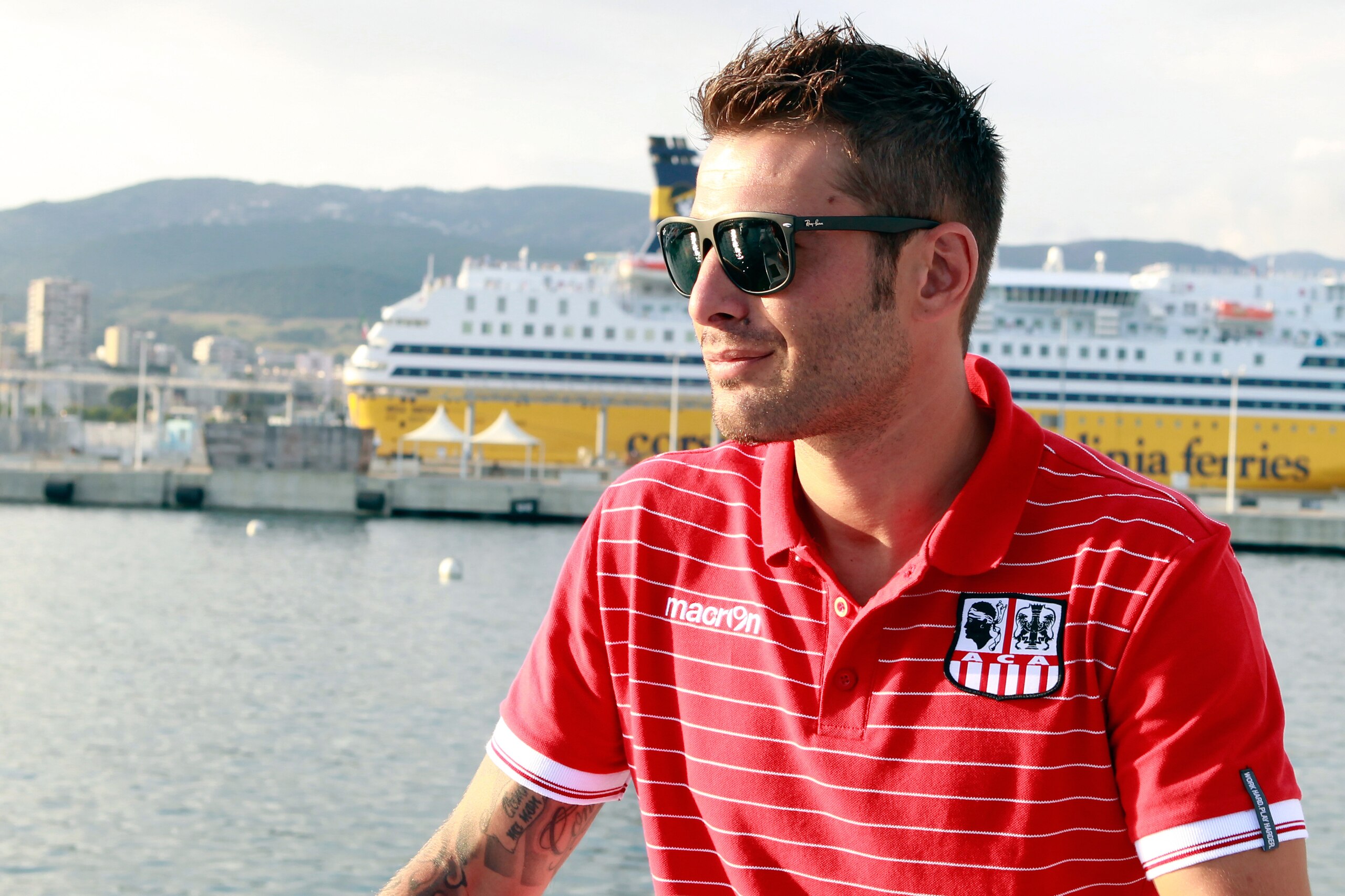 Ajaccio's Romanian forward Adrian Mutu poses on a boat during the presentation of the new jersey of the ACA's football club on July 4, 2013, on a boat in front of Ajaccio city, Corsica. AFP PHOTO / PASCAL POCHARD-CASABIANCA (Photo credit should rea Ajaccio's Romanian forward Adrian Mutu poses on a boat during the presentation of the new jersey of the ACA's football club on July 4, 2013, on a boat in front of Ajaccio city, Corsica. AFP PHOTO / PASCAL POCHARD-CASABIANCA (Photo credit should rea