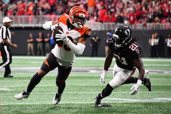 ATLANTA, GA - SEPTEMBER 30: Tyler Boyd #83 of the Cincinnati Bengals runs past Desmond Trufant #21 of the Atlanta Falcons after a catch during the third quarter at Mercedes-Benz Stadium on September 30, 2018 in Atlanta, Georgia. (Photo by Scott Cunningham