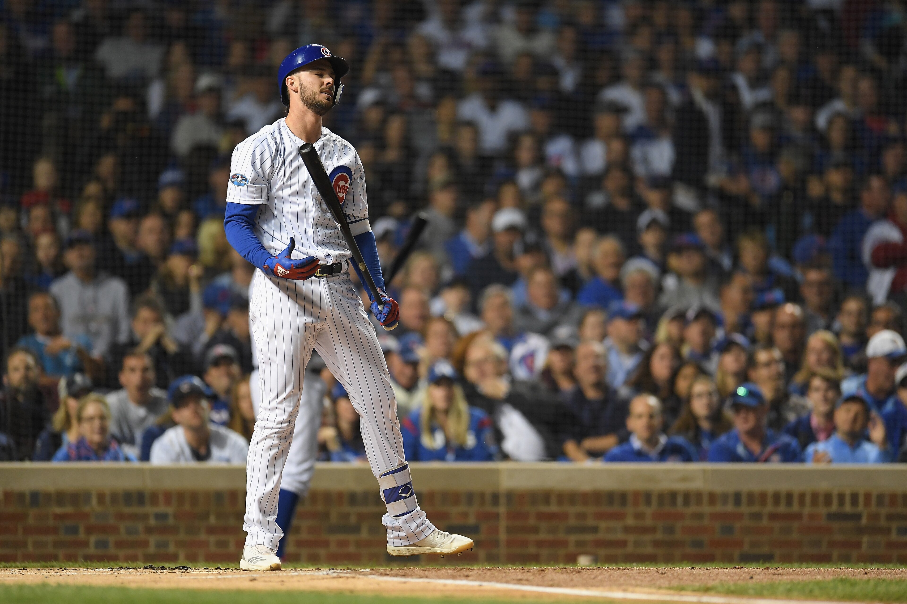 CHICAGO, IL - OCTOBER 02:  Kris Bryant #17 of the Chicago Cubs reacts after striking out in the first inning against the Colorado Rockies during the National League Wild Card Game at Wrigley Field on October 2, 2018 in Chicago, Illinois.  (Photo by Stacy 