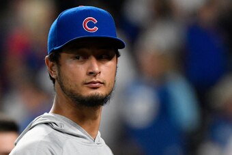 KANSAS CITY, MO - AUGUST 7: Yu Darvish #11 of the Chicago Cubs walks off the field after a 5-0 win over the Kansas City Royals at Kauffman Stadium on August 7, 2018 in Kansas City, Missouri. (Photo by Ed Zurga/Getty Images)