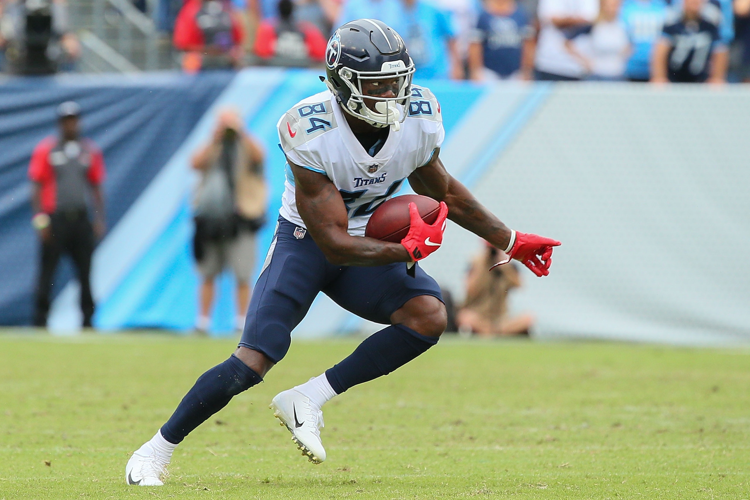 NASHVILLE, TN - SEPTEMBER 16: Corey Davis #84 of the Tennessee Titans plays against the Houston Texans at Nissan Stadium on September 16, 2018 in Nashville, Tennessee. (Photo by Frederick Breedon/Getty Images) NASHVILLE, TN - SEPTEMBER 16: Corey Davis #84 of the Tennessee Titans plays against the Houston Texans at Nissan Stadium on September 16, 2018 in Nashville, Tennessee. (Photo by Frederick Breedon/Getty Images)