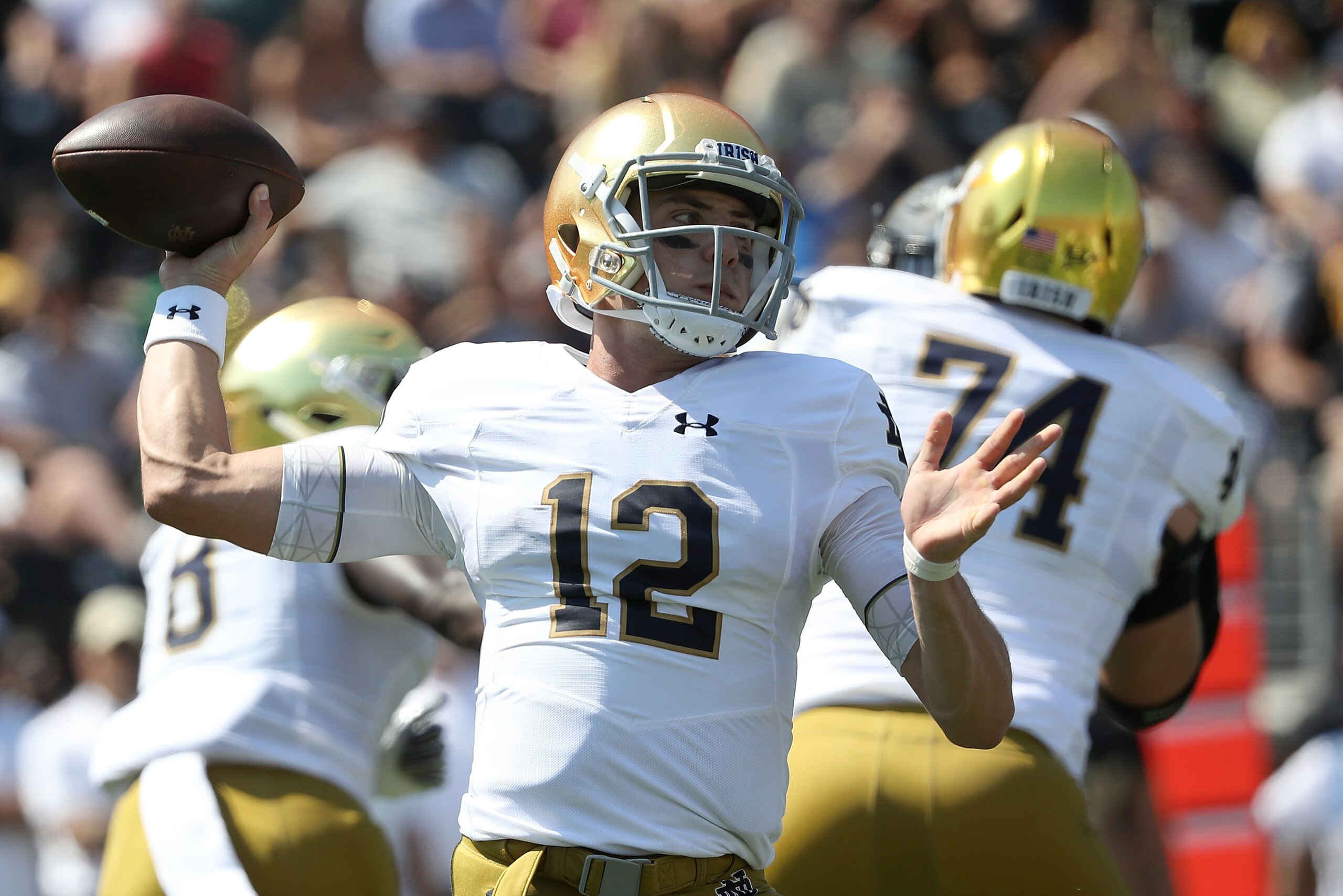 WINSTON SALEM, NC - SEPTEMBER 22:  Ian Book #12 of the Notre Dame Fighting Irish drops back to pass against the Wake Forest Demon Deacons during their game at BB&T Field on September 22, 2018 in Winston Salem, North Carolina.  (Photo by Streeter Lecka/Get