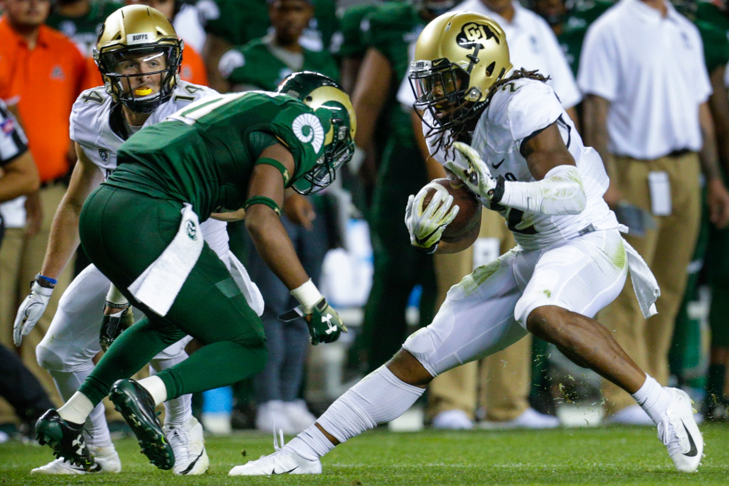 DENVER, CO - AUGUST 31: Safety Tywan Francis #10 of the Colorado State Rams tackles wide receiver Laviska Shenault Jr. #2 of the Colorado Buffaloes at Broncos Stadium at Mile High on August 31, 2018 in Denver, Colorado. (Photo by Joe Mahoney/Getty Images)