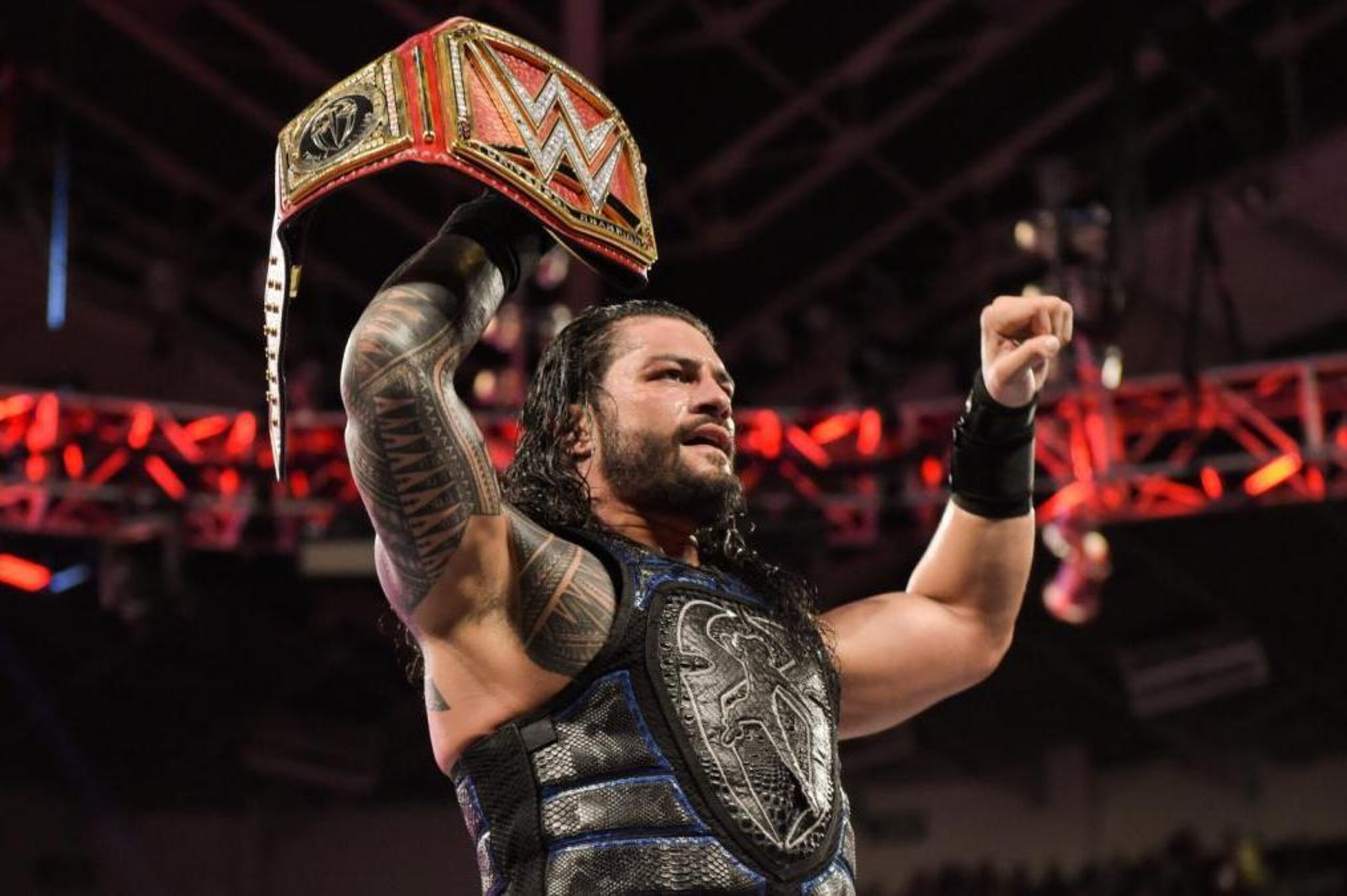 Your winner and still champion because the belt wasn't in jeopardy at all, Roman Reigns!