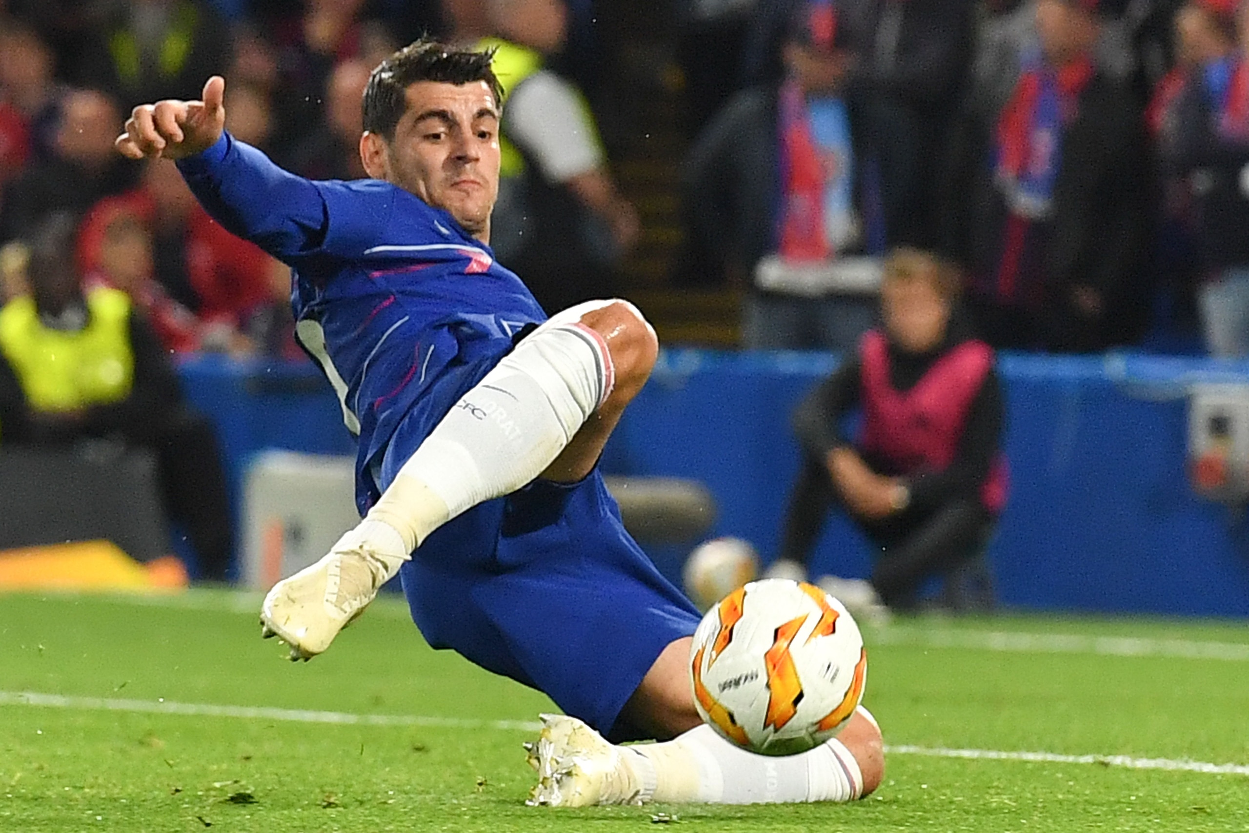 Chelsea's Spanish striker Alvaro Morata strikes the ball but missing the chance during the UEFA Europa League Group L football match between Chelsea and Vidi at Stamford Bridge in London on October 4, 2018. (Photo by Ben STANSALL / AFP)        (Photo cred