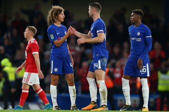 LONDON, ENGLAND - SEPTEMBER 20: Gary Cahill of Chelsea shakes hands with Ethan Ampadu and Dujon Sterling of Chelsea during the Carabao Cup Third Round match between Chelsea and Nottingham Forest at Stamford Bridge on September 20, 2017 in London, England.