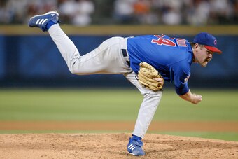 ATLANTA - OCTOBER 5:  Starting pitcher Kerry Wood #34 of the Chicago Cubs delivers a pitch against the Atlanta Braves in the fourth inning during game five of the National League Division Series October 5, 2003 at Turner Field in Atlanta, Georgia.  (Photo