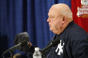 BOSTON - OCTOBER 12:  At an October 12, 2003 press conference prior to Game 4, bench coach Don Zimmer #54 of the New York Yankees answers questions about his Game 3 scuffle with pitcher Pedro Martinez #54 of the Boston Red Sox, during the 2003 American Le