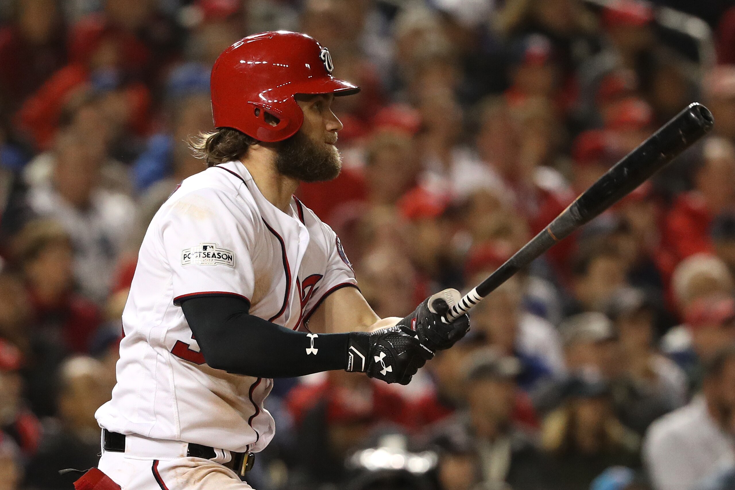 WASHINGTON, DC - OCTOBER 12: Bryce Harper #34 of the Washington Nationals hits a single against the Chicago Cubs during the fourth inning in game five of the National League Division Series at Nationals Park on October 12, 2017 in Washington, DC. (Photo b