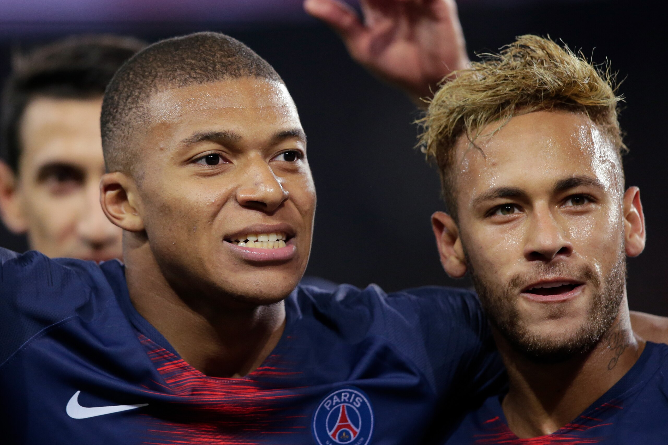 PARIS, FRANCE - OCTOBER 7: Kylian Mbappe of Paris Saint Germain celebrates 5-0 with Neymar Jr of Paris Saint Germain  during the French League 1  match between Paris Saint Germain v Olympique Lyon at the Parc des Princes on October 7, 2018 in Paris France