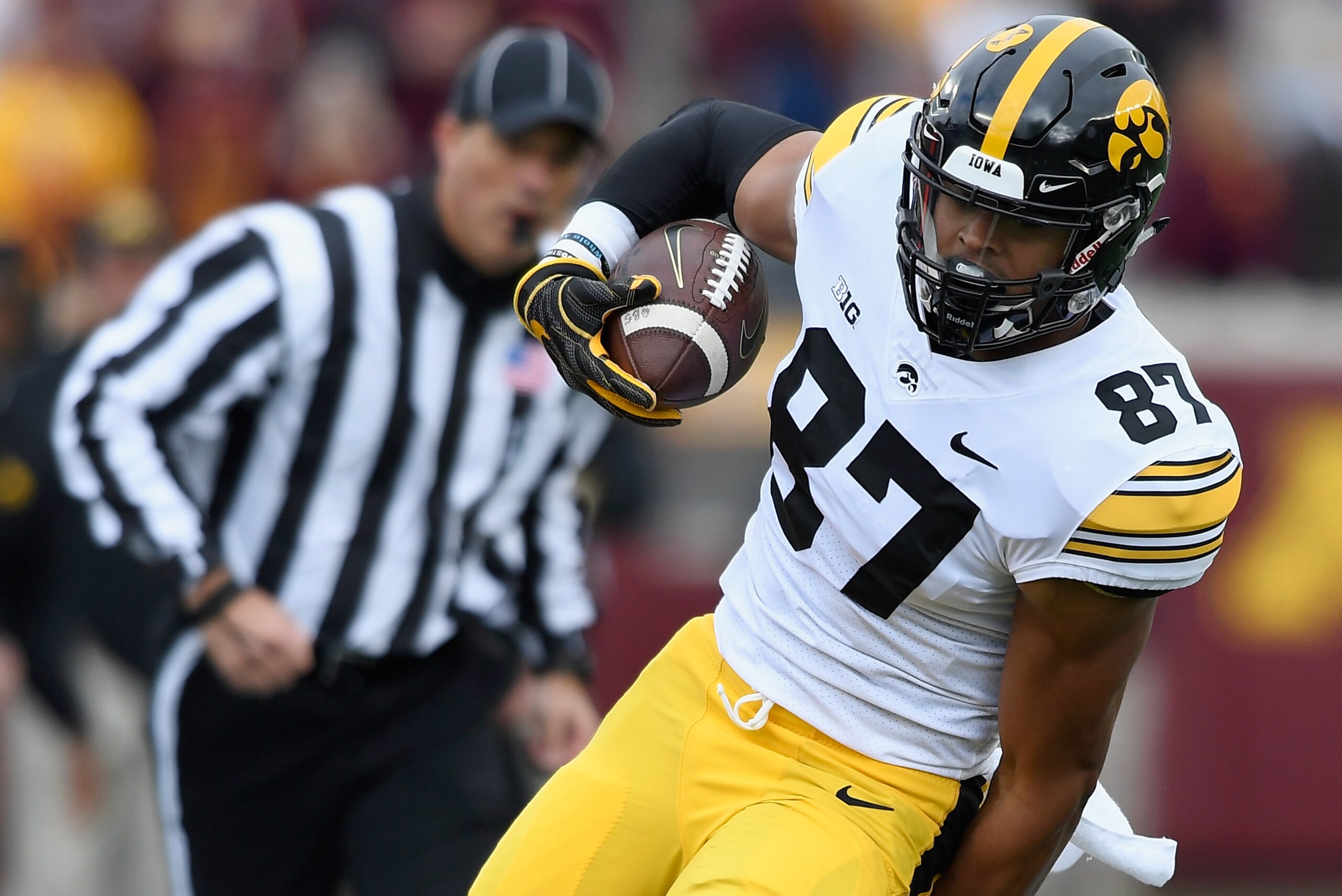MINNEAPOLIS, MN - OCTOBER 06: Julian Huff #20 of the Minnesota Golden Gophers pushes Noah Fant #87 of the Iowa Hawkeyes out of bounds during the second quarter of the game on October 6, 2018 at TCF Bank Stadium in Minneapolis, Minnesota. (Photo by Hannah 