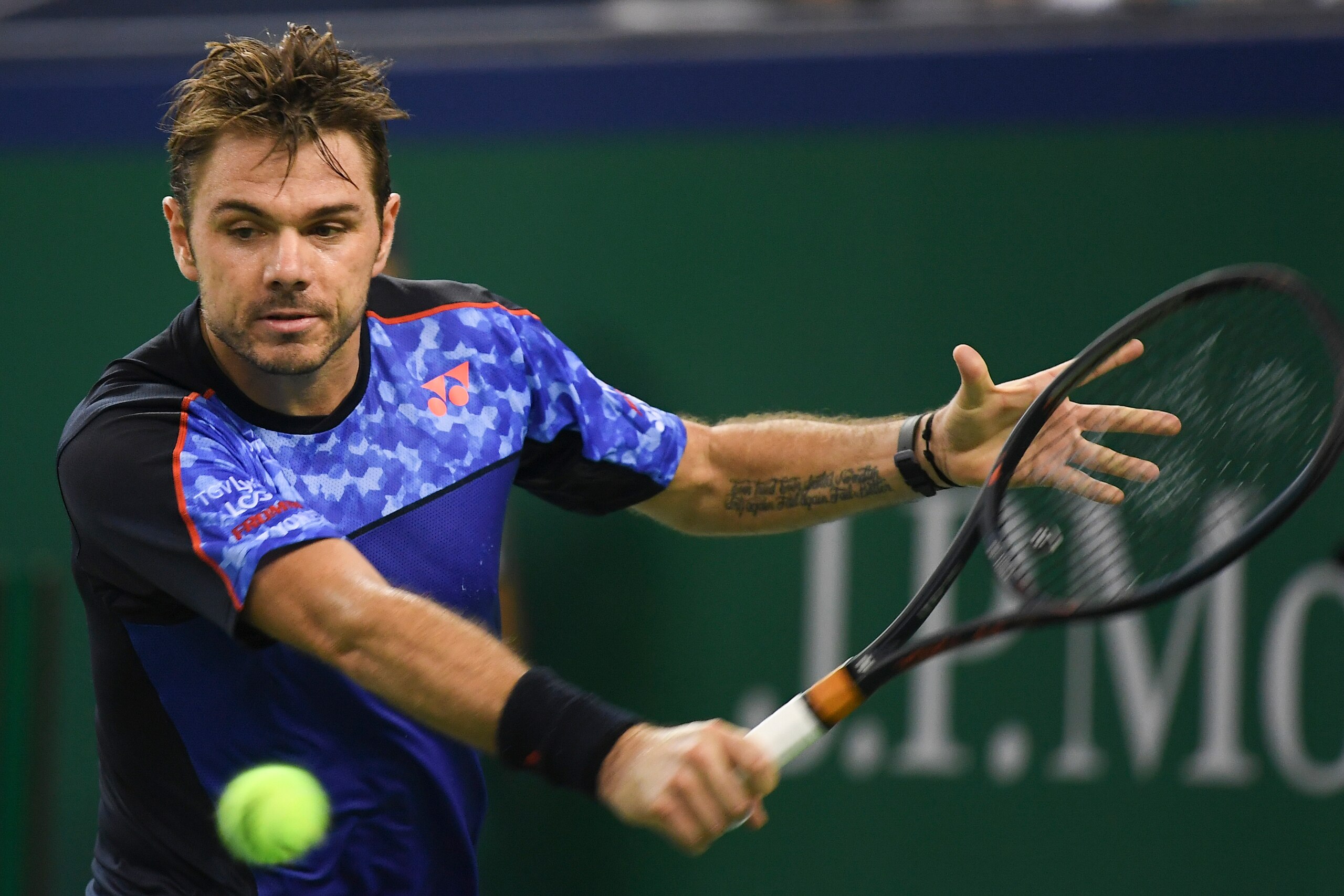 SHANGHAI, CHINA - OCTOBER 08: Stan Wawrinka of Switzerland hits a return  against Borna Coric of Croatia during First Round in 2018 Rolex Shanghai Masters on Day 2 at Qi Zhong Tennis Centre at Qi Zhong Tennis Centre on October 8, 2018 in Shanghai, China. 