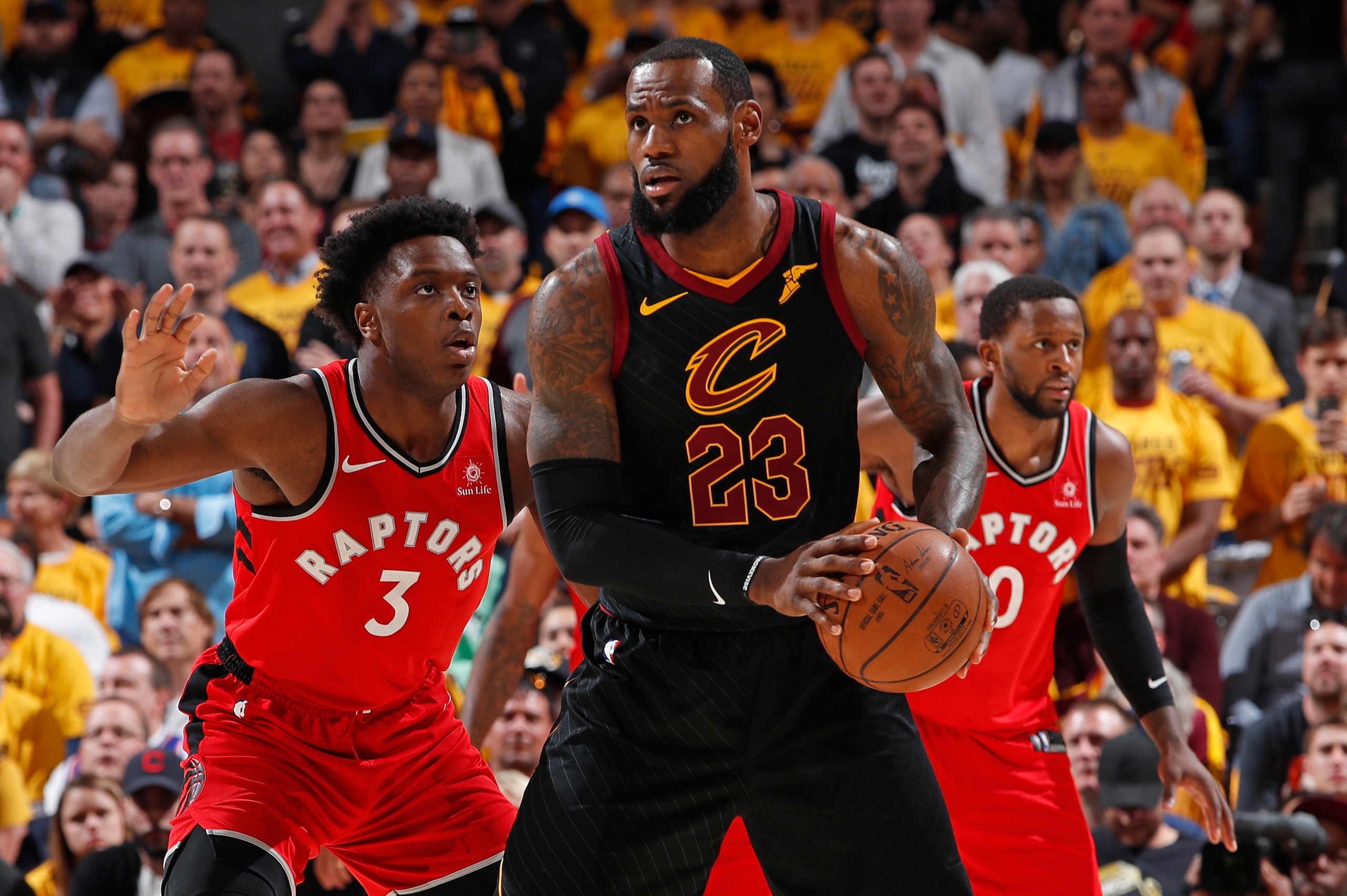 CLEVELAND, OH - MAY 7: LeBron James #23 of the Cleveland Cavaliers handles the ball against OG Anunoby #3 of the Toronto Raptors during Game Four of the Eastern Conference Semifinals of the 2018 NBA Playoffs on May 7, 2018 at Quicken Loans Arena in Clevel