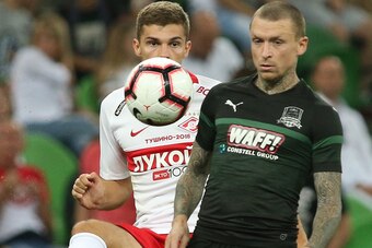 KRASNODAR, RUSSIA - AUGUST 18: Pavel Mamayev (R) of FC Krasnodar vies for the ball with Roman Zobnin of FC Spartak Moscow during the Russian Premier League match between FC Krasnodar v FC Spartak Moscow at Krasnodar Stadium on August 18, 2018 in Krasnodar