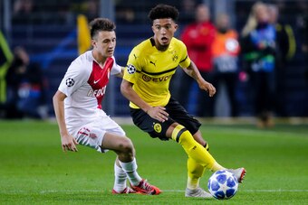 DORTMUND, GERMANY - OCTOBER 3: (L-R) Aleksandr Golovin of AS Monaco, Jadon Sancho of Borussia Dortmund during the UEFA Champions League  match between Borussia Dortmund v AS Monaco at the Signal Iduna Park on October 3, 2018 in Dortmund Germany (Photo by 