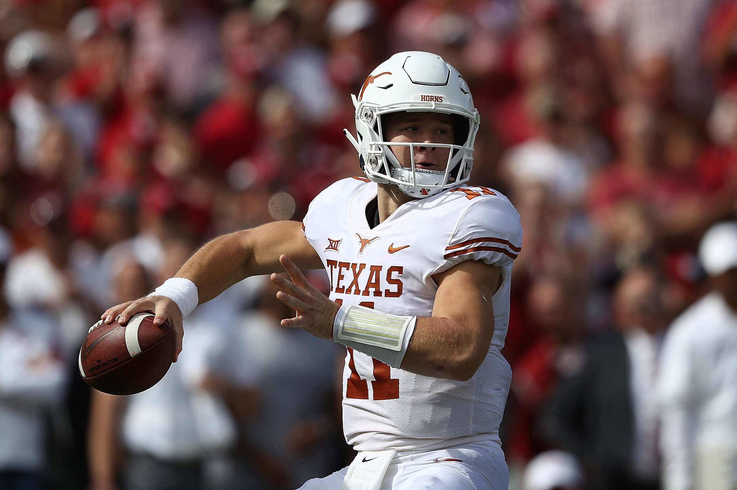 DALLAS, TX - OCTOBER 06:  Sam Ehlinger #11 of the Texas Longhorns during the 2018 AT&T Red River Showdown at Cotton Bowl on October 6, 2018 in Dallas, Texas.  (Photo by Ronald Martinez/Getty Images)