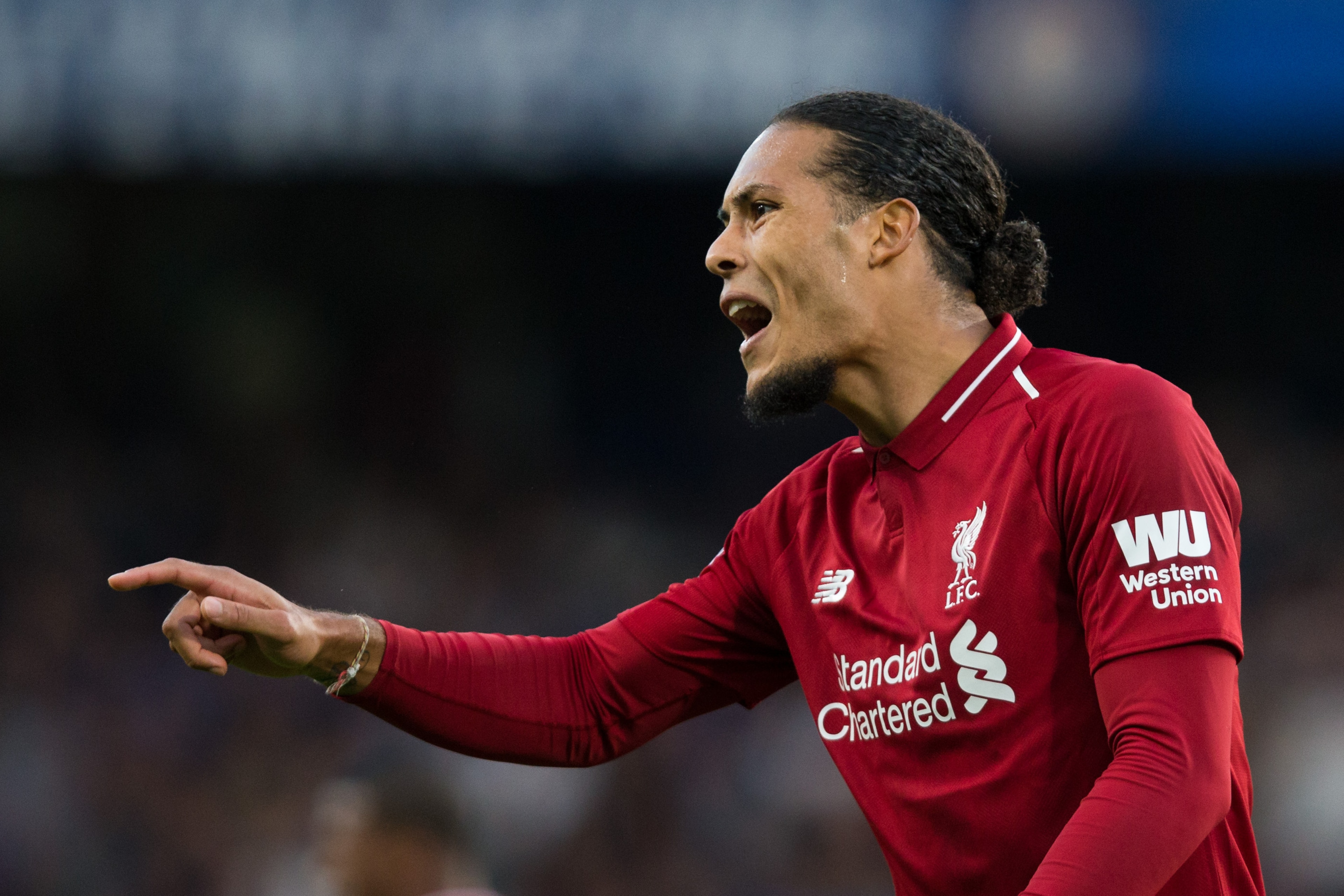 LONDON, ENGLAND - SEPTEMBER 29:  Virgil van Dijk of Liverpool reacts during the Premier League match between Chelsea FC and Liverpool FC at Stamford Bridge on September 29, 2018 in London, United Kingdom. (Photo by Craig Mercer/MB Media/Getty Images)