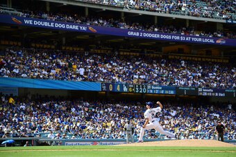 LOS ANGELES, CA - OCTOBER 01:  Walker Buehler #21 of the Los Angeles Dodgers pitches in the sixth inning of the game against the Colorado Rockies at Dodger Stadium on October 1, 2018 in Los Angeles, California.  (Photo by Jayne Kamin-Oncea/Getty Images)