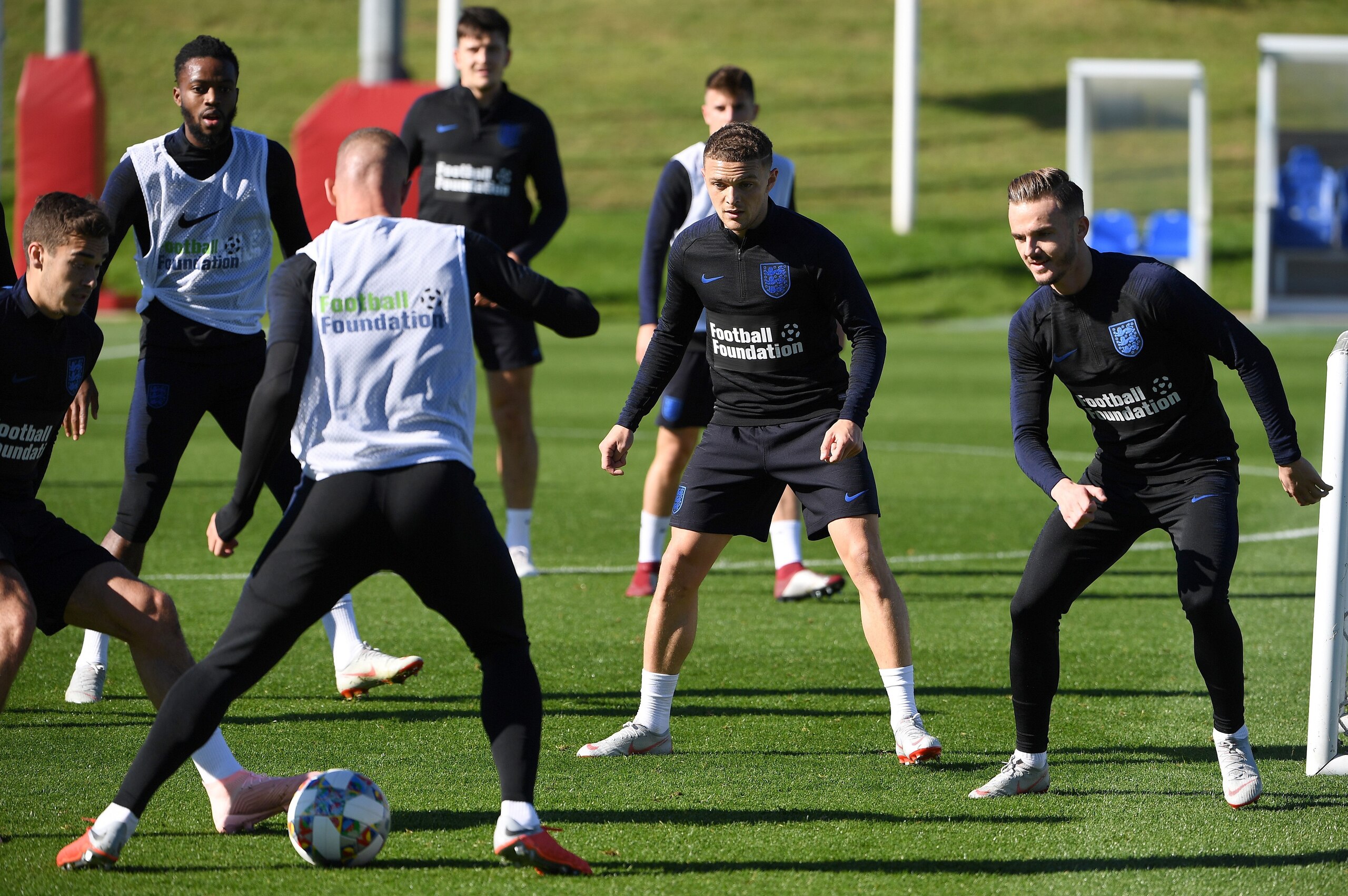 England's midfielder James Maddison (R) watches the ball during an open training session at St George's Park in Burton-on-Trent, central England on October 9, 2018 ahead of their UEFA Nations League match against Croatia on October 12. (Photo by Paul ELLI