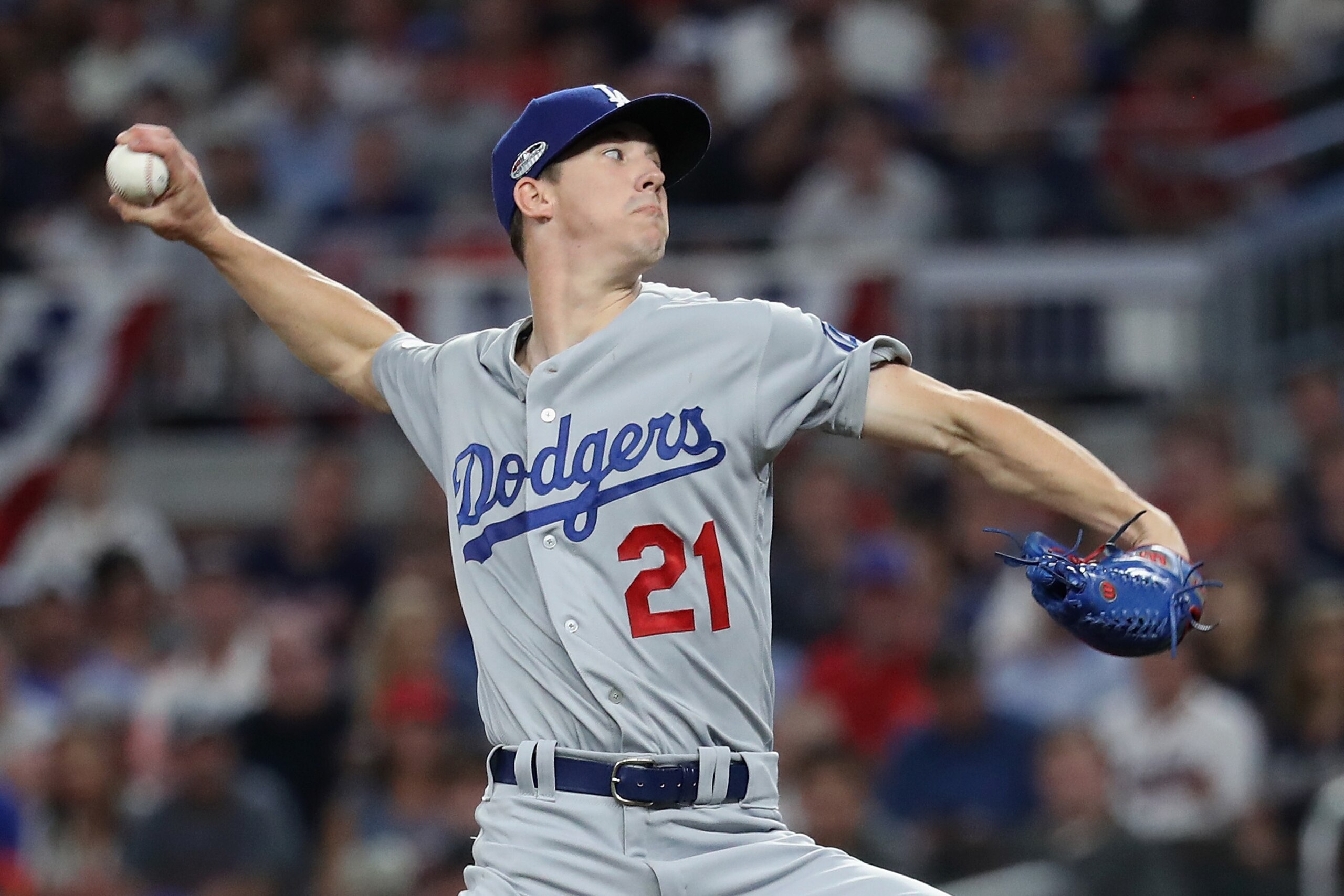 ATLANTA, GA - OCTOBER 07:  Walker Buehler #21 of the Los Angeles Dodgers pitches in the first inning against the Atlanta Braves during Game Three of the National League Division Series at SunTrust Park on October 7, 2018 in Atlanta, Georgia.  (Photo by Ro