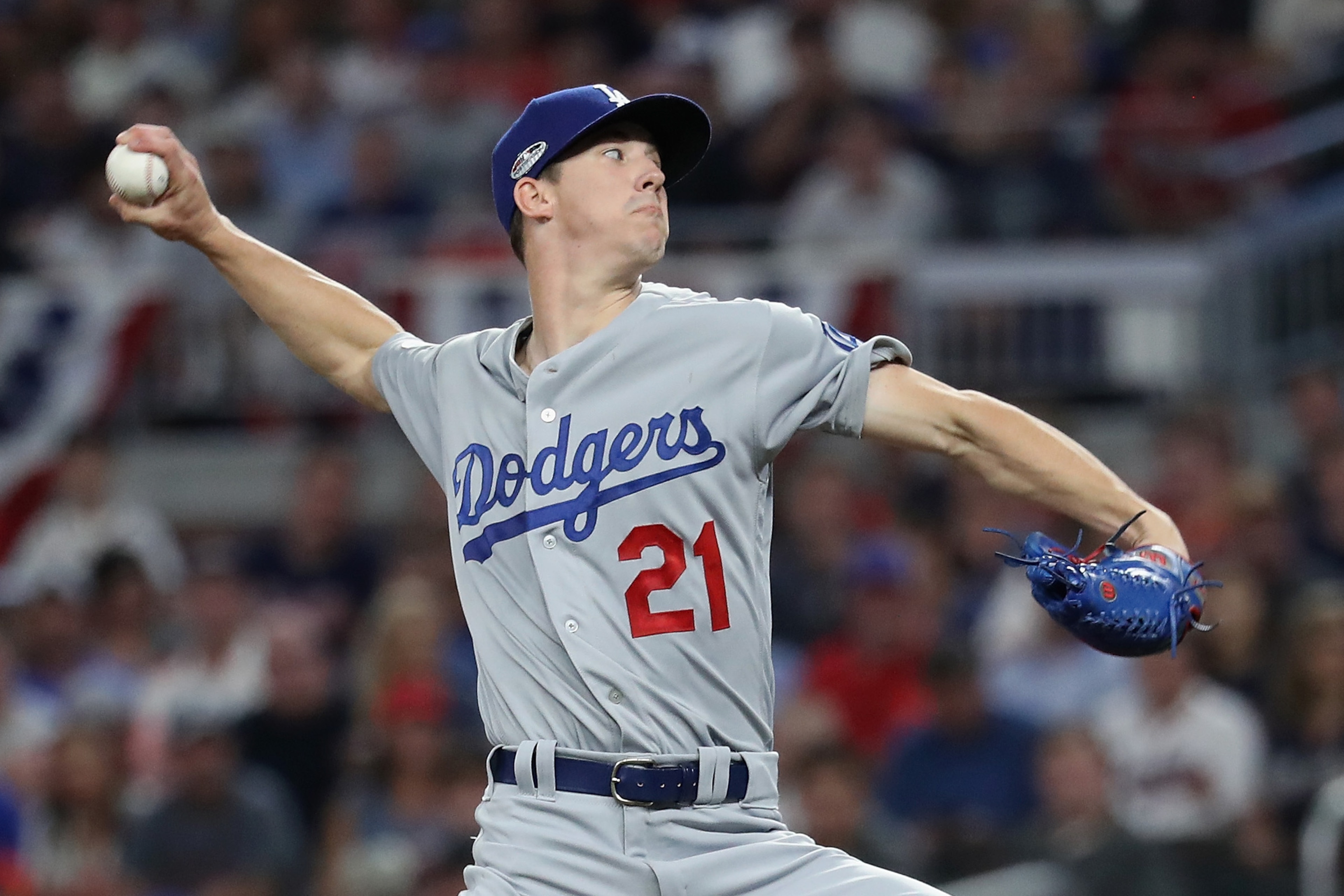 ATLANTA, GA - OCTOBER 07:  Walker Buehler #21 of the Los Angeles Dodgers pitches in the first inning against the Atlanta Braves during Game Three of the National League Division Series at SunTrust Park on October 7, 2018 in Atlanta, Georgia.  (Photo by Ro