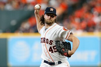 HOUSTON, TX - OCTOBER 06:  Gerrit Cole #45 of the Houston Astros delivers a pitch in the seventh inning against the Cleveland Indians during Game Two of the American League Division Series at Minute Maid Park on October 6, 2018 in Houston, Texas.  (Photo 