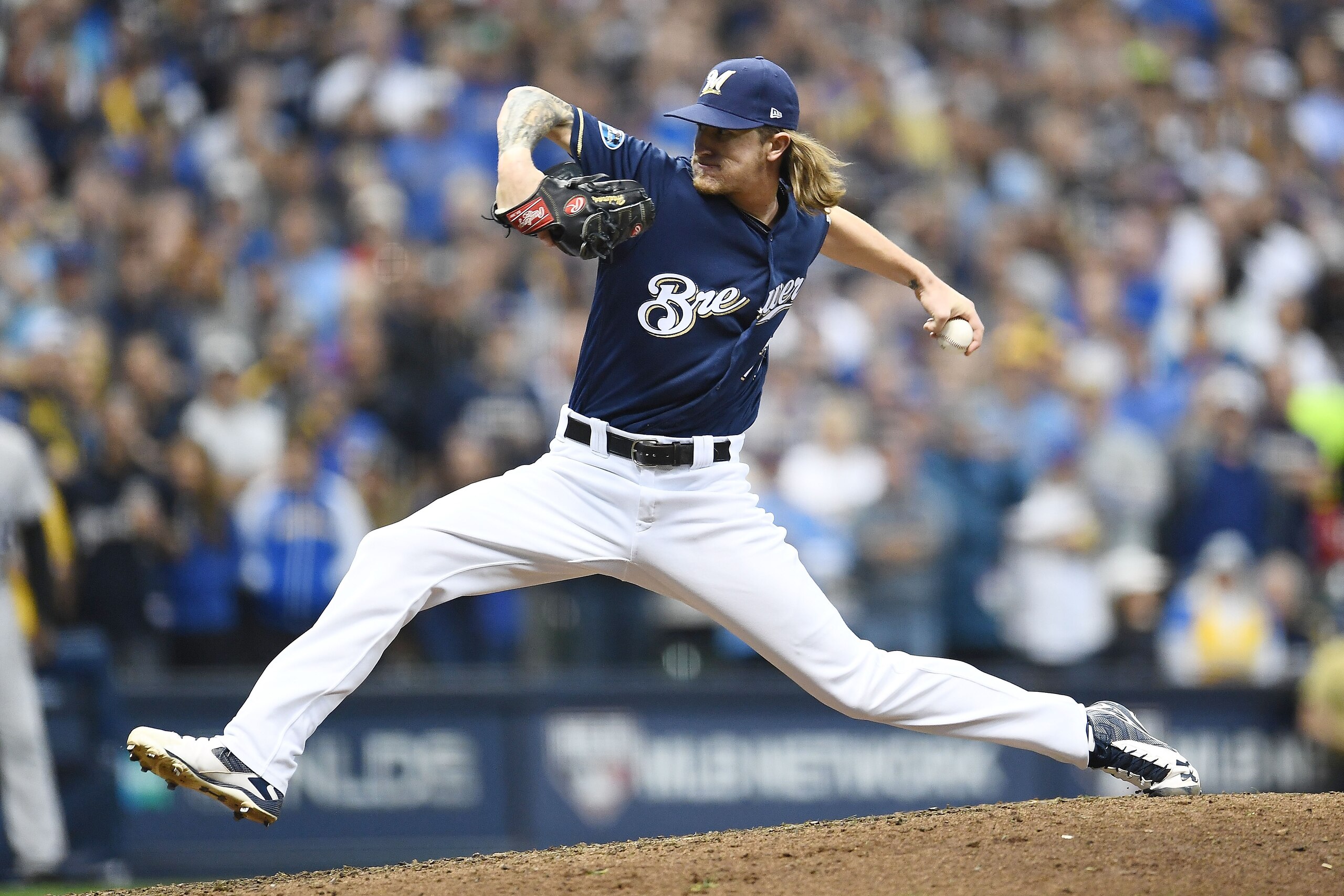 MILWAUKEE, WI - OCTOBER 05:  Josh Hader #71 of the Milwaukee Brewers throws a pitch during Game Two of the National League Divisional Series against the Colorado Rockies at Miller Park on October 5, 2018 in Milwaukee, Wisconsin.  The Brewers defeated the 