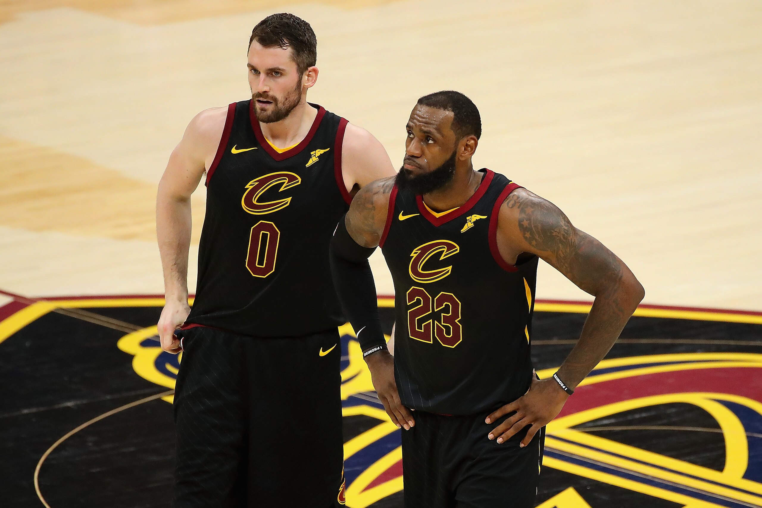 CLEVELAND, OH - MAY 19:  Kevin Love #0 and LeBron James #23 of the Cleveland Cavaliers look on in the first half against the Boston Celtics during Game Three of the 2018 NBA Eastern Conference Finals at Quicken Loans Arena on May 19, 2018 in Cleveland, Oh