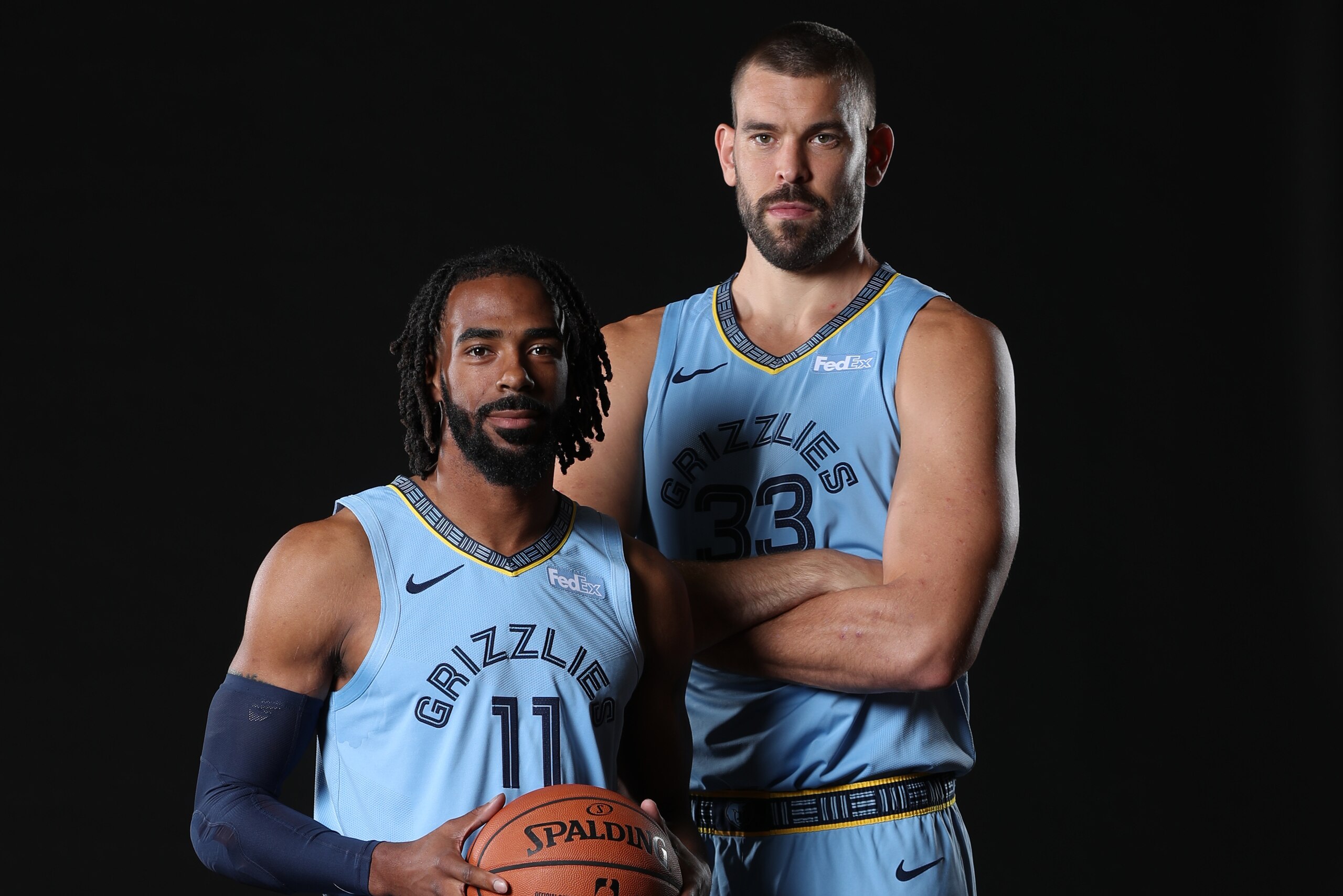 MEMPHIS, TN - SEPTEMBER 24: Mike Conley #11 and Marc Gasol #33 of the Memphis Grizzlies pose for a portrait during Memphis Grizzlies Media Day on September 24, 2018 at FedExForum in Memphis, Tennessee.  NOTE TO USER: User expressly acknowledges and agrees