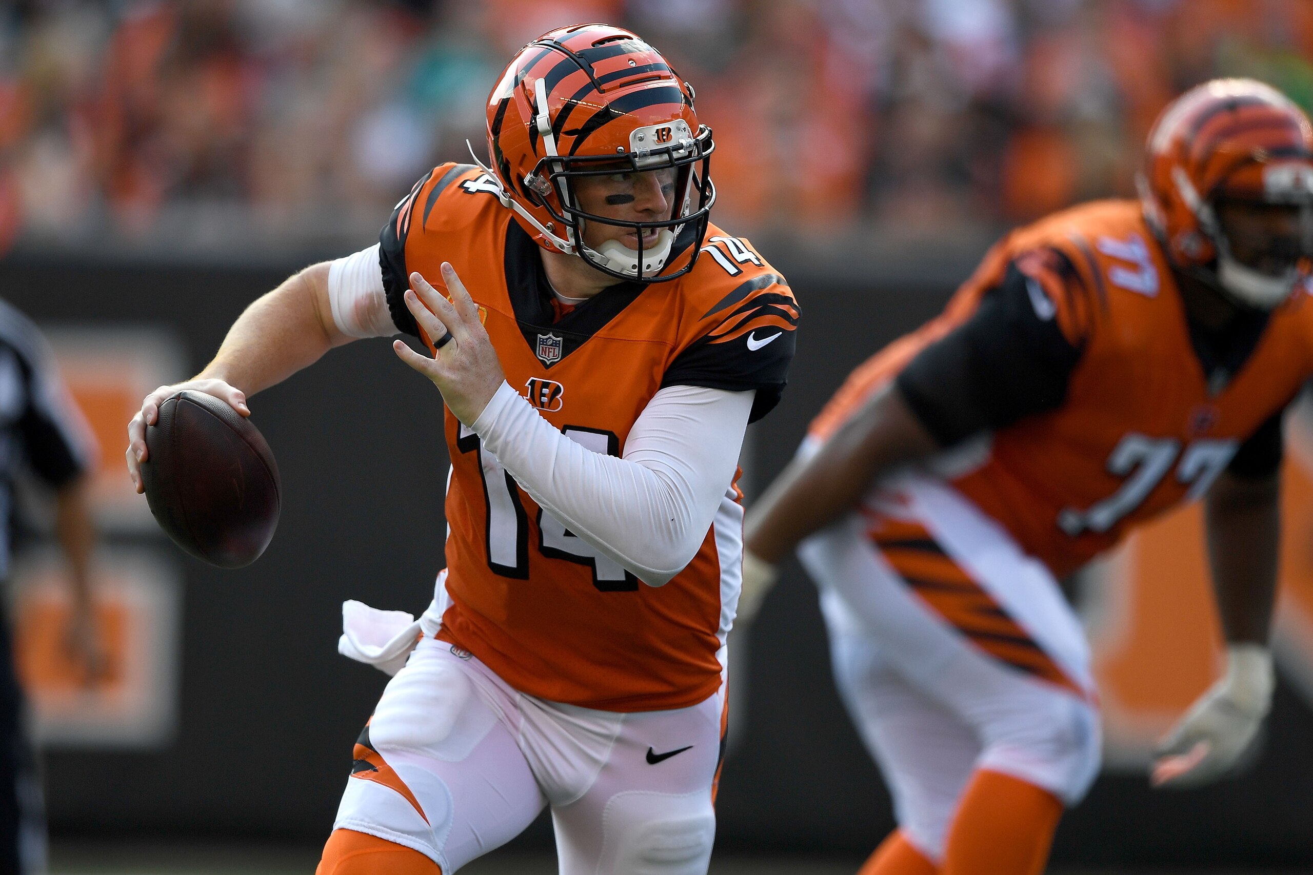 CINCINNATI, OH - OCTOBER 7:  Andy Dalton #14 of the Cincinnati Bengals runs with the ball during the third quarter of the game against the Miami Dolphins at Paul Brown Stadium on October 7, 2018 in Cincinnati, Ohio. (Photo by Bobby Ellis/Getty Images)