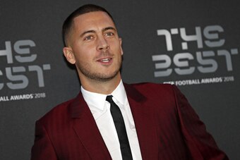 Chelsea and Belgium midfielder Eden Hazard poses for a photograph as he arrives for The Best FIFA Football Awards ceremony, on September 24, 2018 in London. (Photo by Adrian DENNIS / AFP)        (Photo credit should read ADRIAN DENNIS/AFP/Getty Images)
