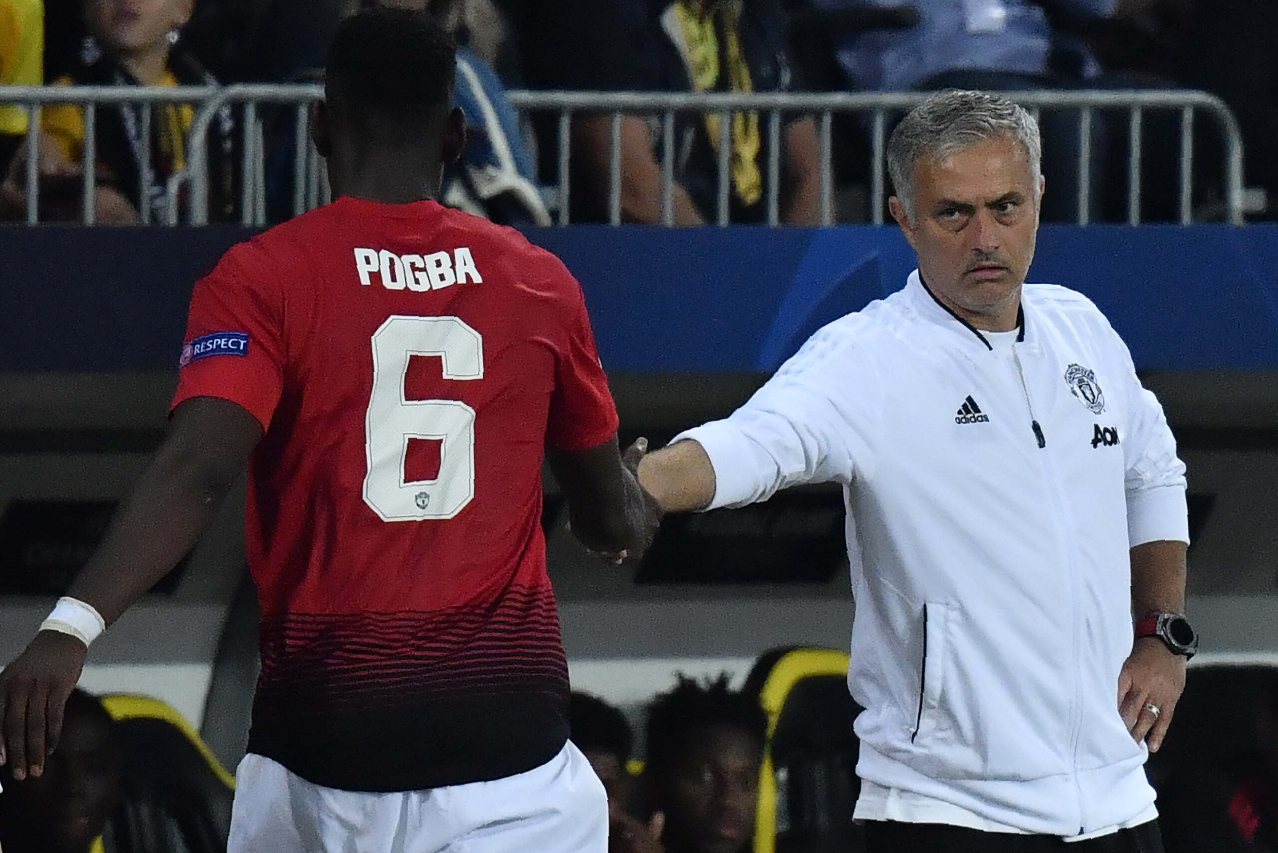 Manchester United's French midfielder Paul Pogba (L) shakes hands with Manchester United's Portuguese manager Jose Mourinho after his substitution during the UEFA Champions League group H football match between Young Boys and Manchester United at The Stad Manchester United's French midfielder Paul Pogba (L) shakes hands with Manchester United's Portuguese manager Jose Mourinho after his substitution during the UEFA Champions League group H football match between Young Boys and Manchester United at The Stad