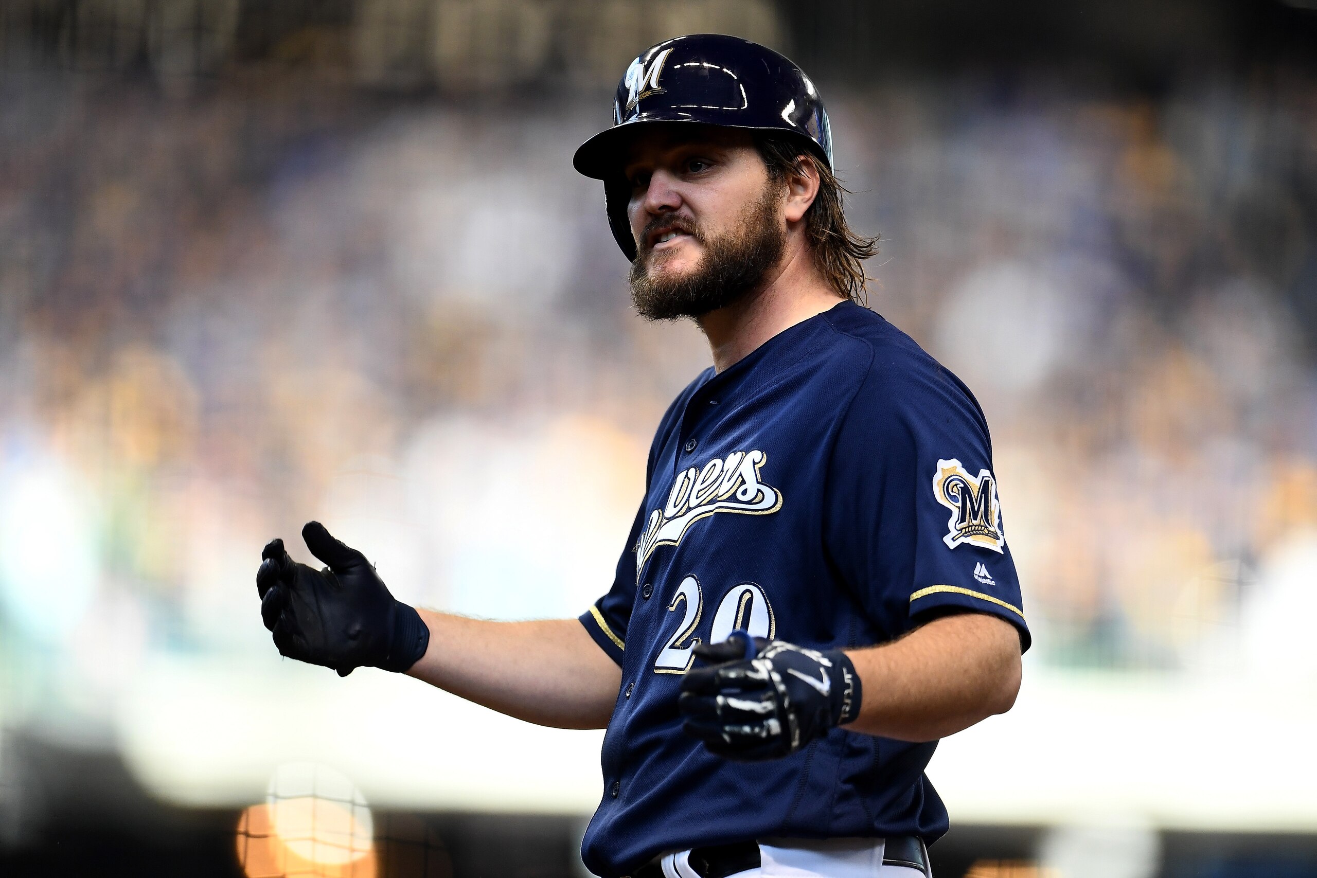 MILWAUKEE, WI - OCTOBER 13: Wade Miley #20 of the Milwaukee Brewers celebrates after hitting a single against Hyun-Jin Ryu #99 of the Los Angeles Dodgers during the fifth inning in Game Two of the National League Championship Series at Miller Park on Oct MILWAUKEE, WI - OCTOBER 13: Wade Miley #20 of the Milwaukee Brewers celebrates after hitting a single against Hyun-Jin Ryu #99 of the Los Angeles Dodgers during the fifth inning in Game Two of the National League Championship Series at Miller Park on Oct