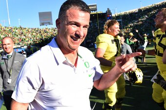 EUGENE, OR - OCTOBER 13:  Head coach Mario Cristobal of the Oregon Ducks celebrates after his team won the game against the Washington Huskies at Autzen Stadium on October 13, 2018 in Eugene, Oregon. The Ducks won the game 30-27.  (Photo by Steve Dykes/Ge