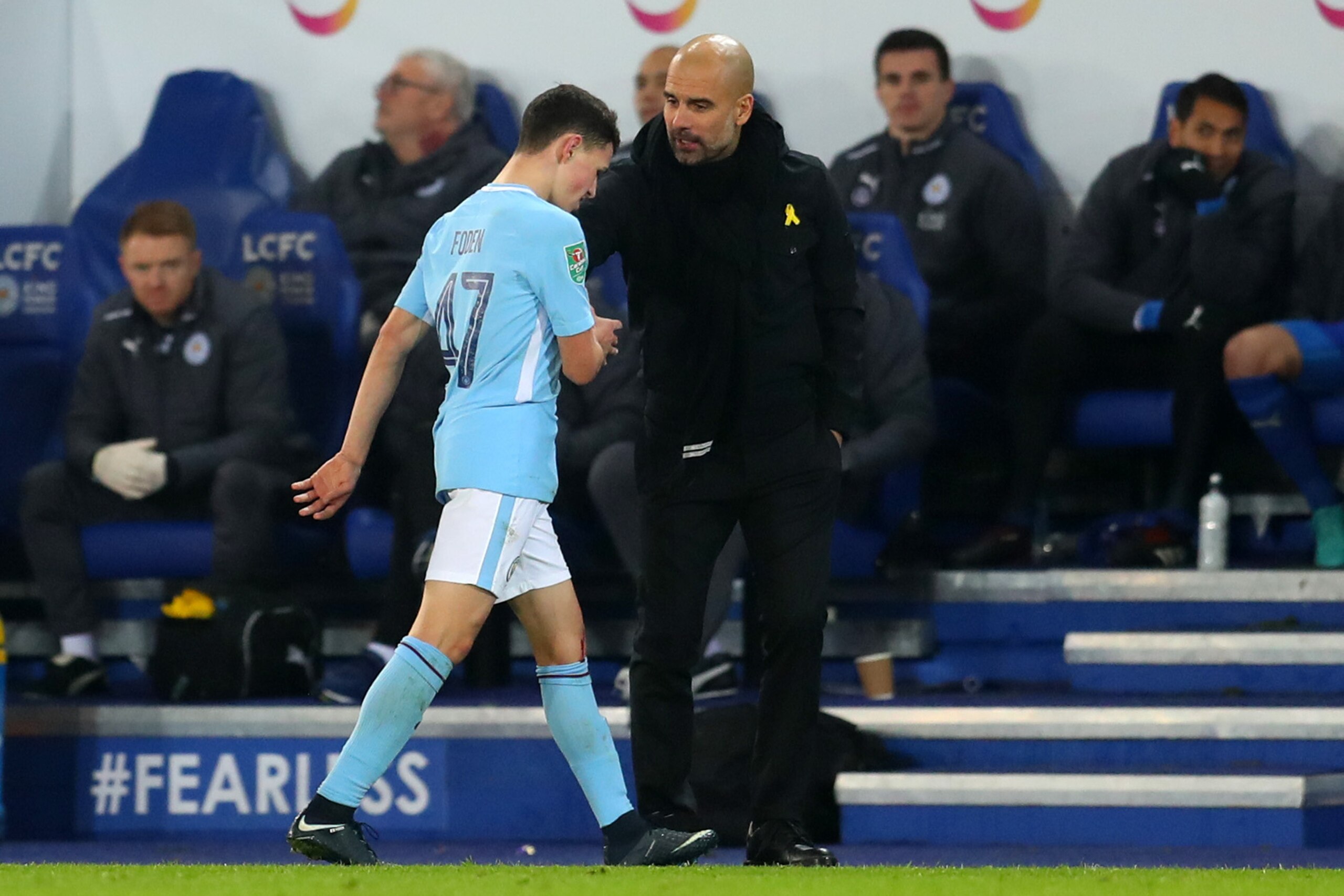 LEICESTER, ENGLAND - DECEMBER 19: Pep Guardiola the head coach / manager of Manchester City and Phil Foden of Manchester City during the Carabao Cup Quarter-Final match between Leicester City and Manchester City at The King Power Stadium on December 19, 2 LEICESTER, ENGLAND - DECEMBER 19: Pep Guardiola the head coach / manager of Manchester City and Phil Foden of Manchester City during the Carabao Cup Quarter-Final match between Leicester City and Manchester City at The King Power Stadium on December 19, 2