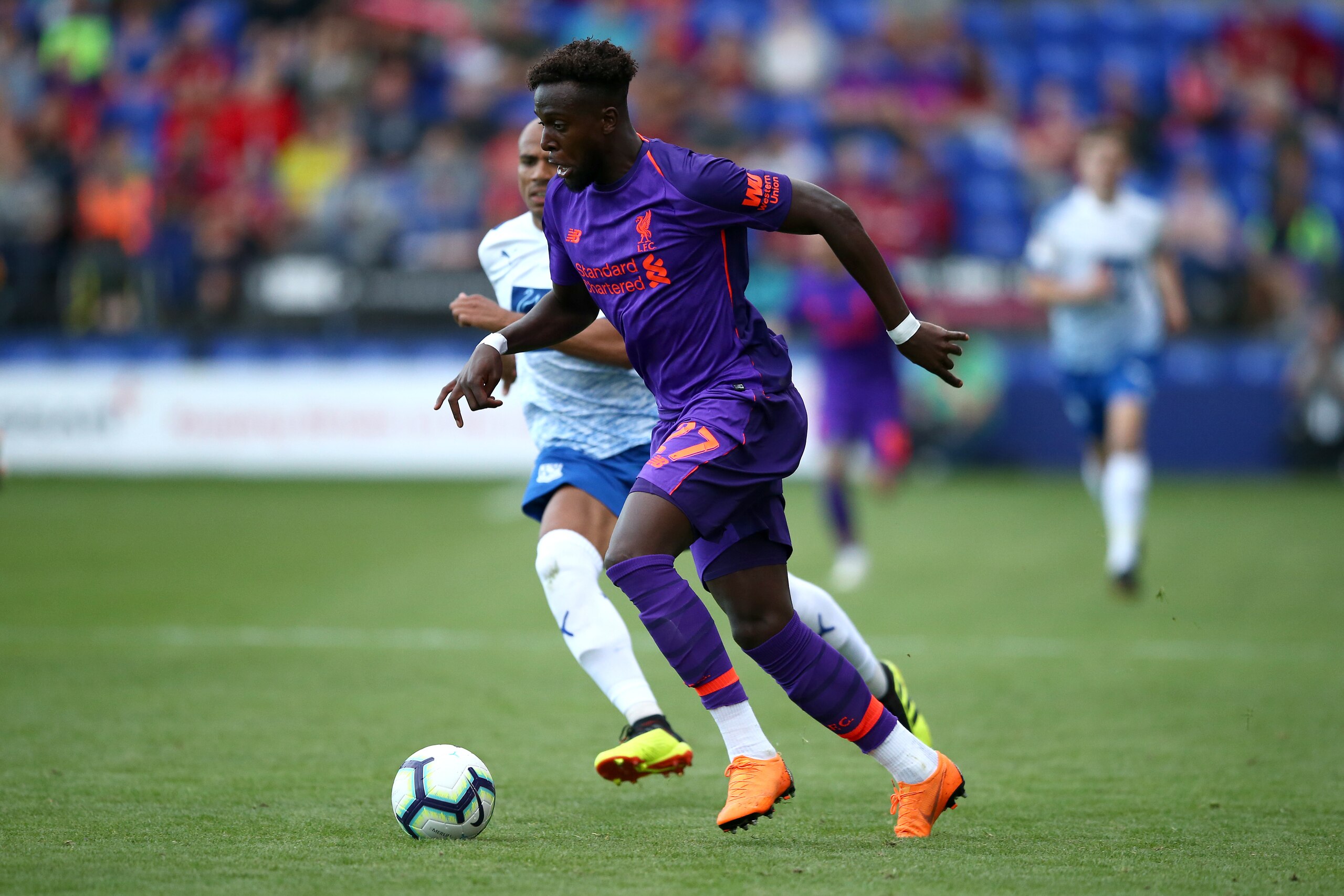 BIRKENHEAD, ENGLAND - JULY 10: Divock Origi of Liverpool controls the ball during the Pre-Season Friendly match between Tranmere Rovers and Liverpool at Prenton Park on July 11, 2018 in Birkenhead, England. (Photo by Jan Kruger/Getty Images)