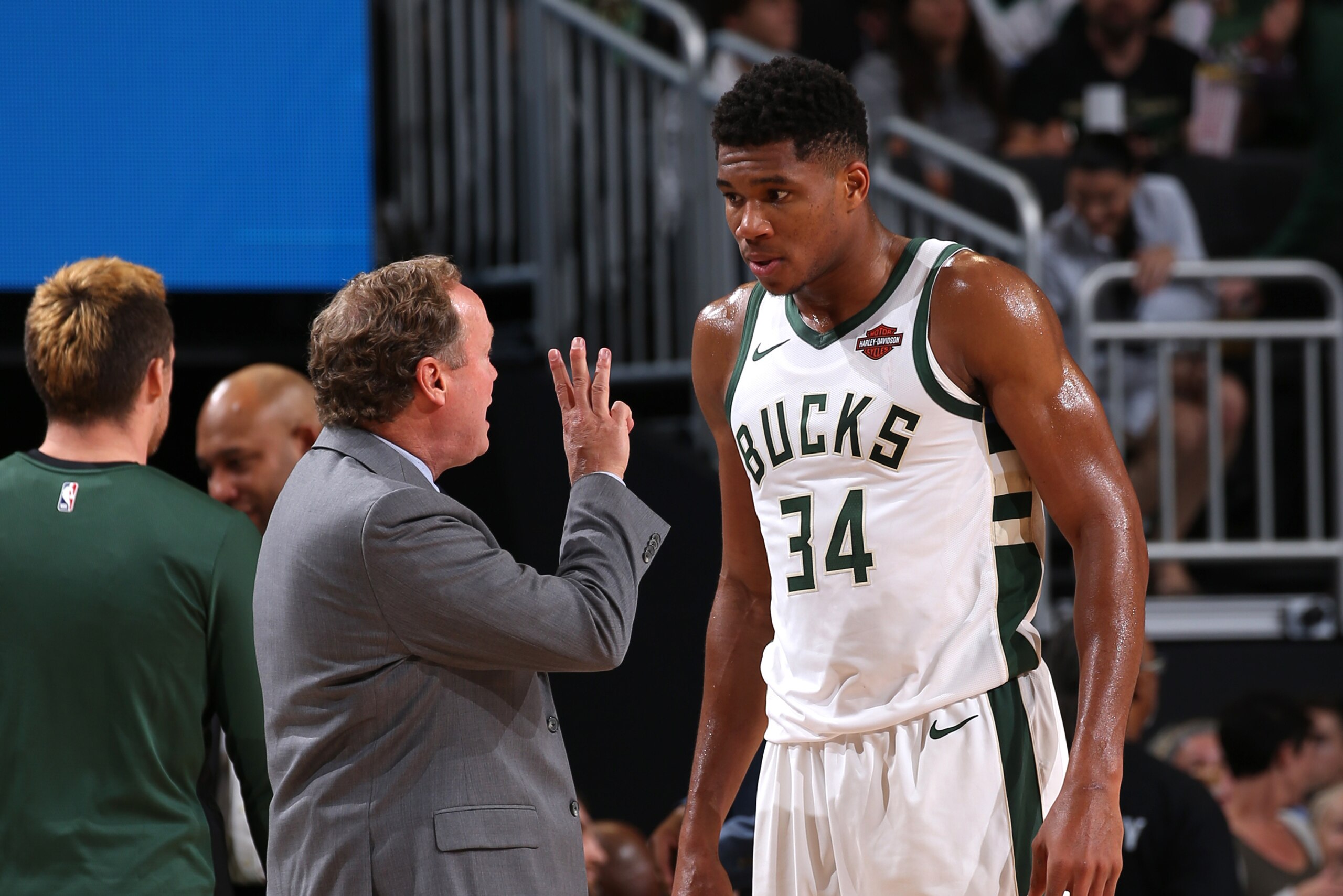 MILWAUKEE, WI - OCTOBER 3:  Giannis Antetokounmpo #34 of the Milwaukee Bucks talks with Mike Budenholzer during the game against the Chicago Bulls during a pre-season game on October 3, 2018 at Fiserv Forum, in Milwaukee, Wisconsin.  NOTE TO USER: User ex
