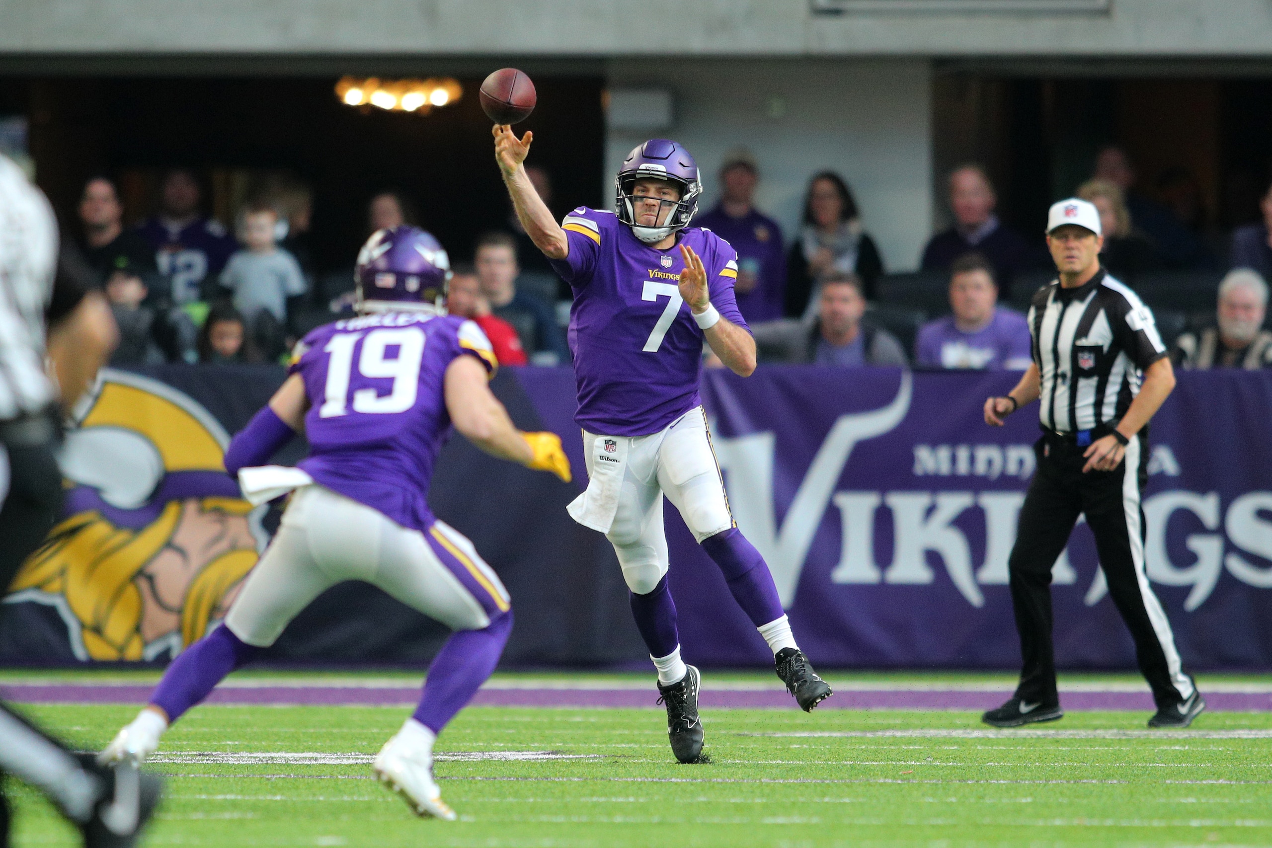 MINNEAPOLIS, MN - DECEMBER 31: Case Keenum #7 passes the ball to Adam Thielen #19 of the Minnesota Vikings in the second quarter of the game against the Chicago Bears on December 31, 2017 at U.S. Bank Stadium in Minneapolis, Minnesota. (Photo by Adam Bett