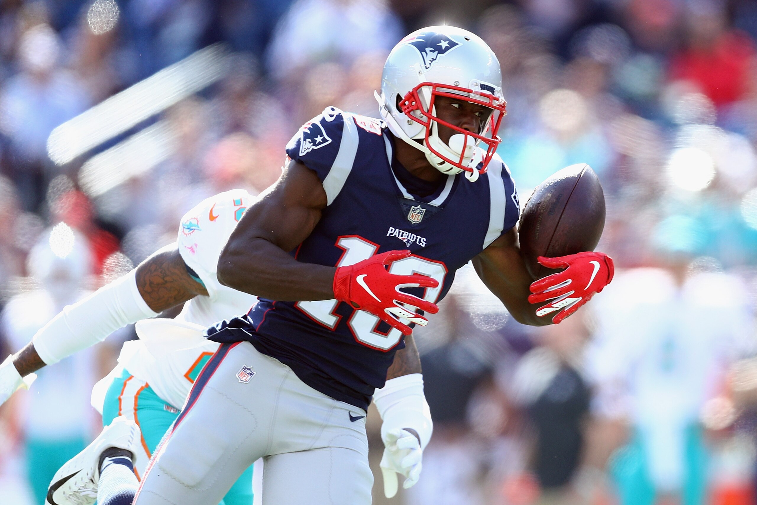 FOXBOROUGH, MA - SEPTEMBER 30: Phillip Dorsett #13 of the New England Patriots is unable to make a reception during the second half against the Miami Dolphins at Gillette Stadium on September 30, 2018 in Foxborough, Massachusetts. (Photo by Maddie Meyer FOXBOROUGH, MA - SEPTEMBER 30: Phillip Dorsett #13 of the New England Patriots is unable to make a reception during the second half against the Miami Dolphins at Gillette Stadium on September 30, 2018 in Foxborough, Massachusetts. (Photo by Maddie Meyer