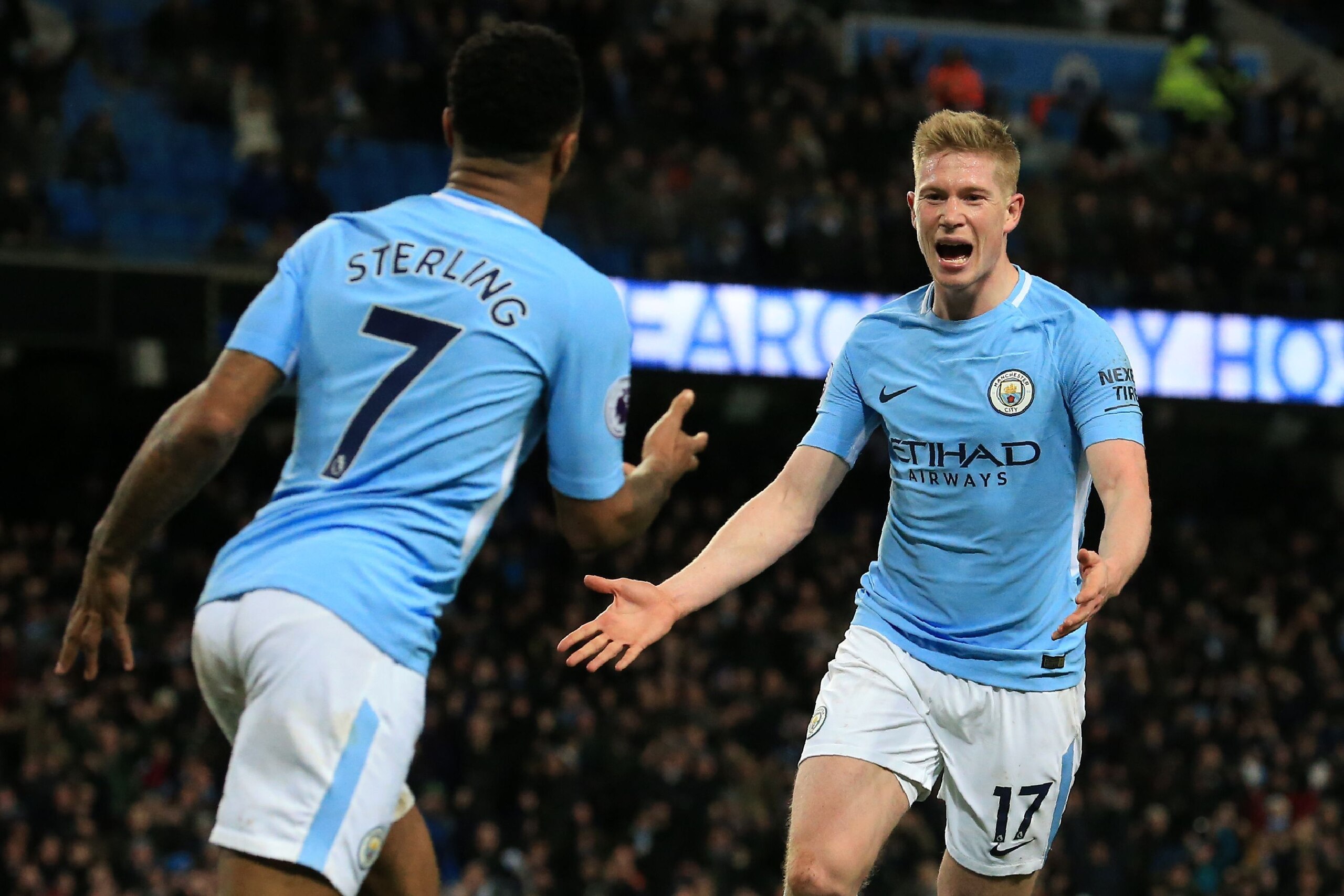 Manchester City's Belgian midfielder Kevin De Bruyne (R) celebrates with Manchester City's English midfielder Raheem Sterling after scoring their second goal during the English Premier League football match between Manchester City and West Bromwich Albion