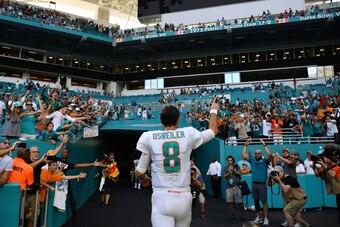 MIAMI, FL - OCTOBER 14:  Brock Osweiler #8 of the Miami Dolphins celebrates as he walks off of the field after the Dolphins defeated the Bears 31 to 28 of the game at Hard Rock Stadium on October 14, 2018 in Miami, Florida.  (Photo by Mark Brown/Getty Ima