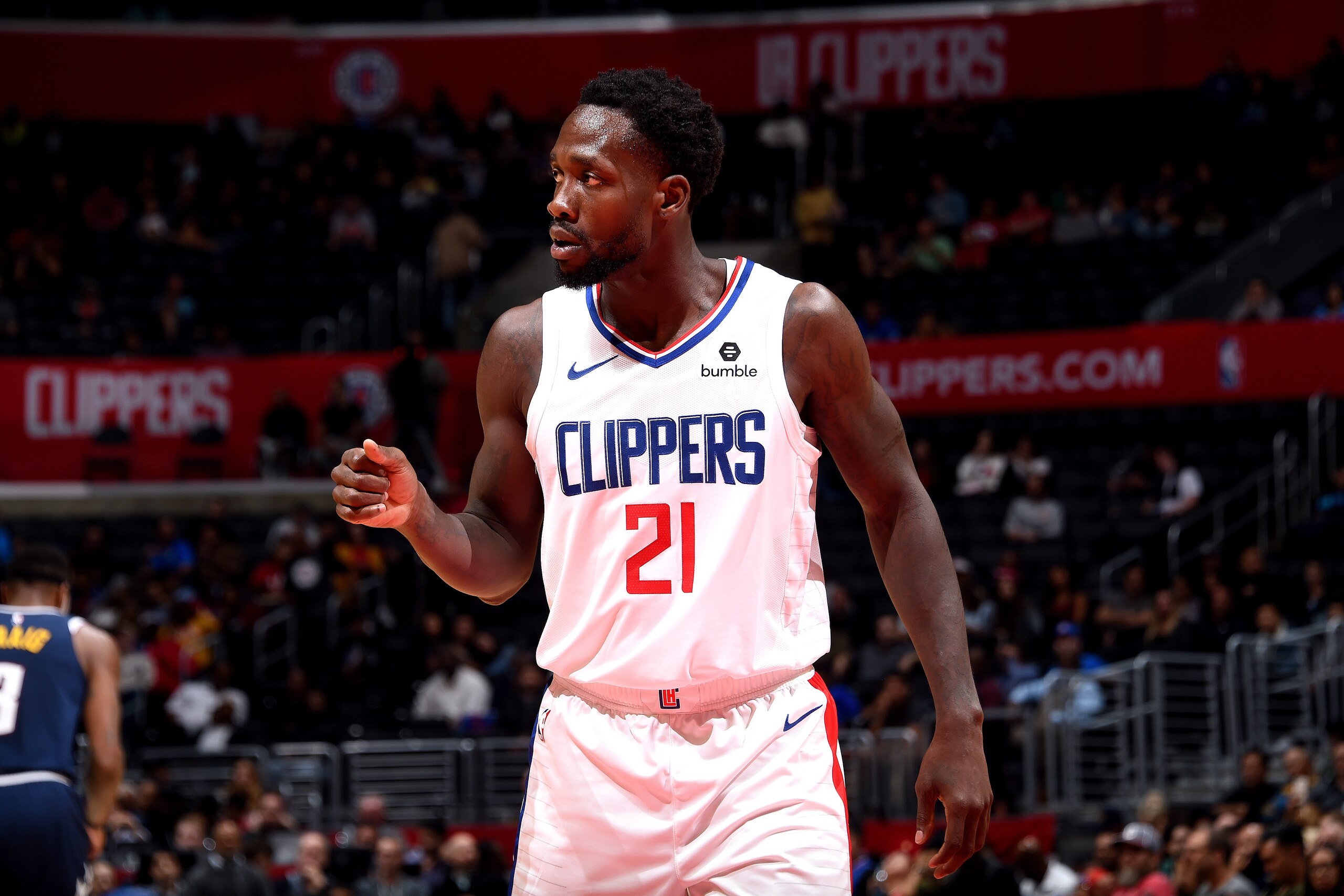 LOS ANGELES, CA - OCTOBER 9: Patrick Beverley #21 of the LA Clippers looks on against the Denver Nuggets during a pre-season game on October 9, 2018 at Staples Center in Los Angeles, California. NOTE TO USER: User expressly acknowledges and agrees that, b
