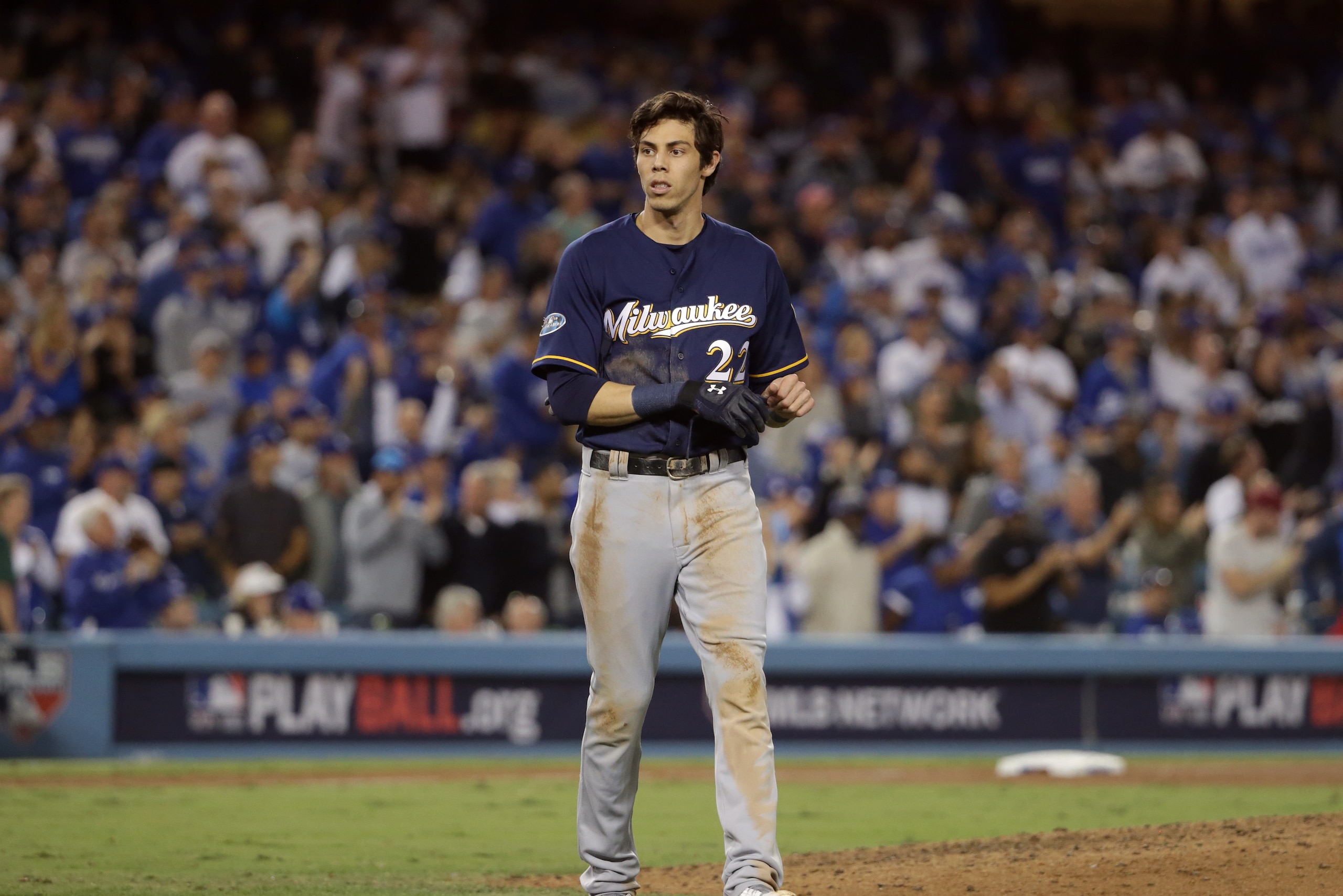 LOS ANGELES, CA - OCTOBER 16: Christian Yelich #22 of the Milwaukee Brewers looks on after the end of the eighth inning during Game Four of the National League Championship Series against the Los Angeles Dodgers at Dodger Stadium on October 16, 2018 in Lo