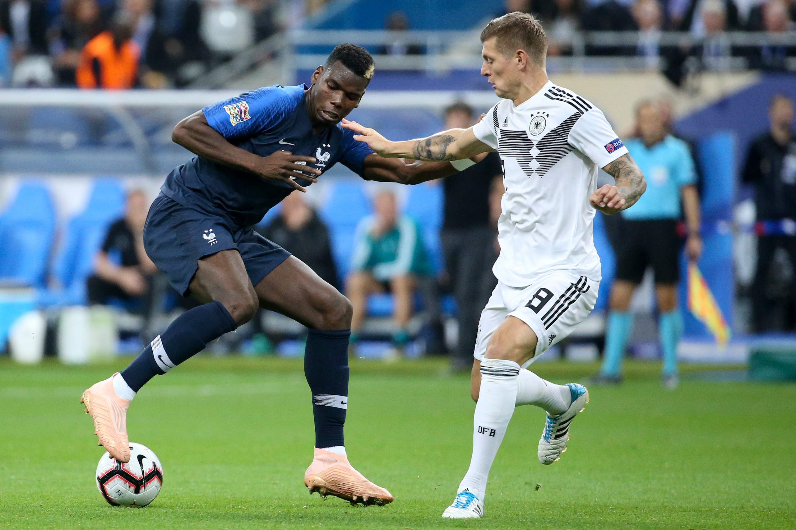PARIS, FRANCE - OCTOBER 16: Paul Pogba of France, Toni Kroos of Germany during the UEFA Nations League A group one match between France and Germany at Stade de France on October 16, 2018 in Paris, France. (Photo by Jean Catuffe/Getty Images)